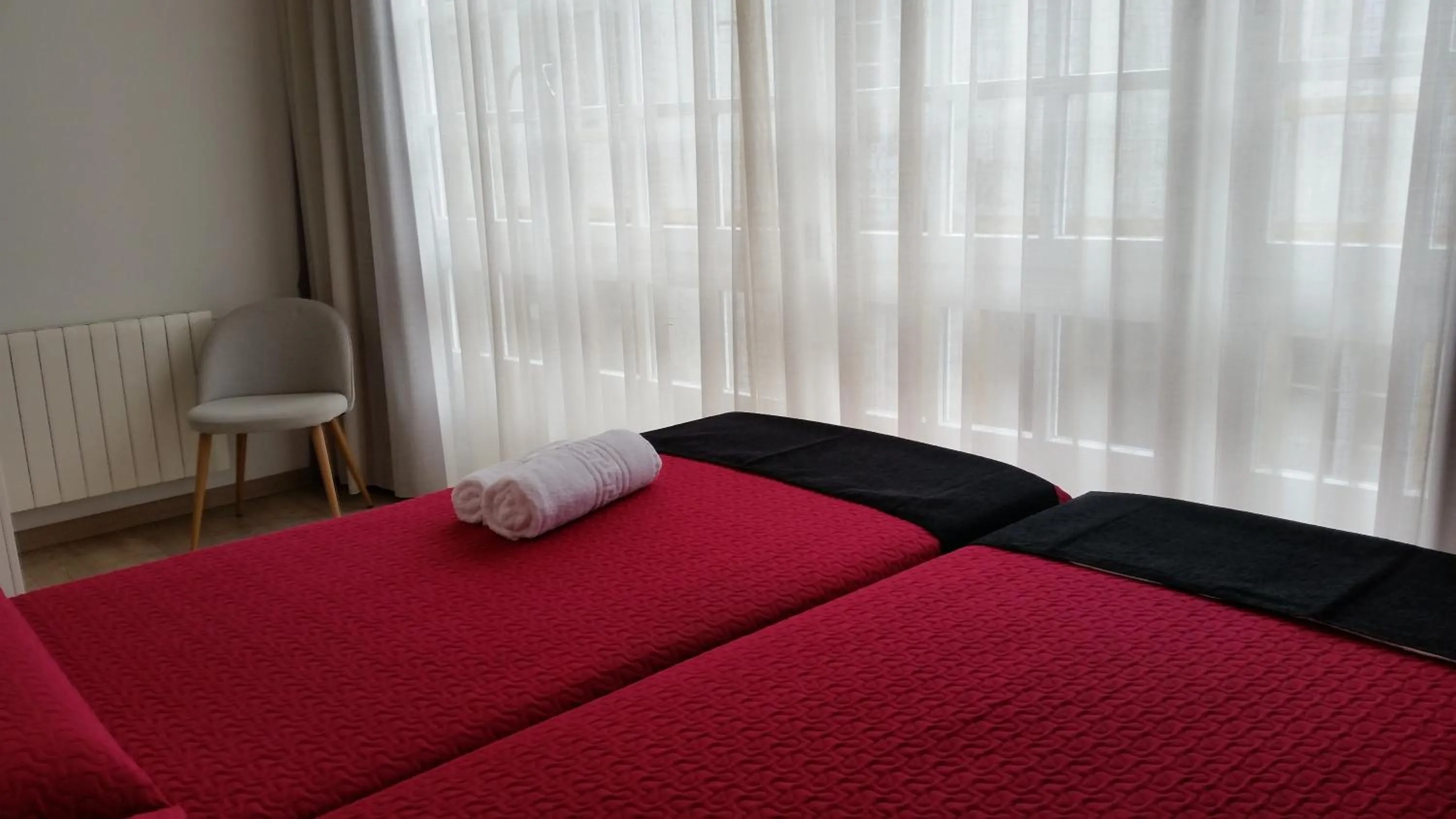 Bed in Pensión Domus Gallery