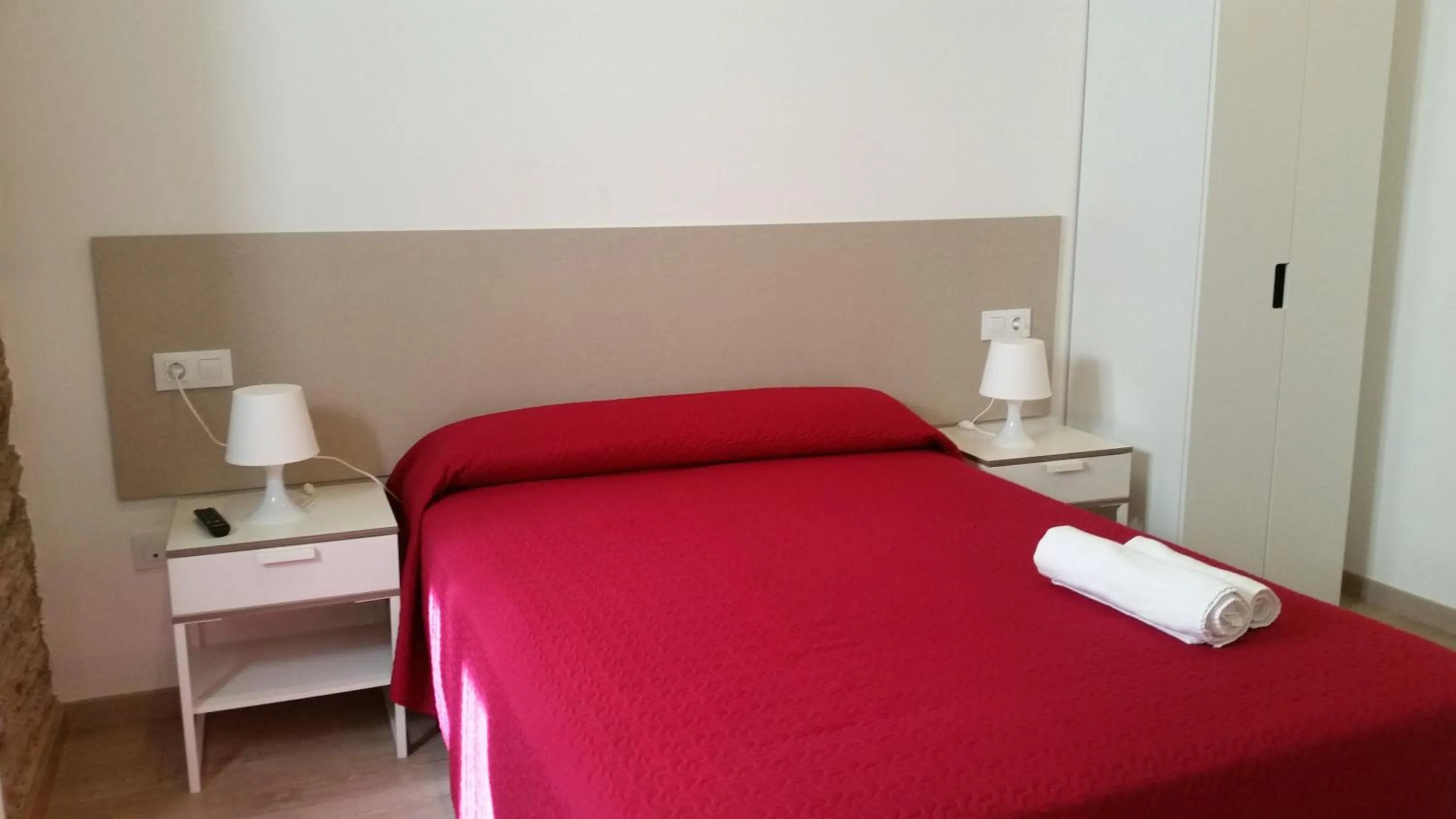 Bed in Pensión Domus Gallery