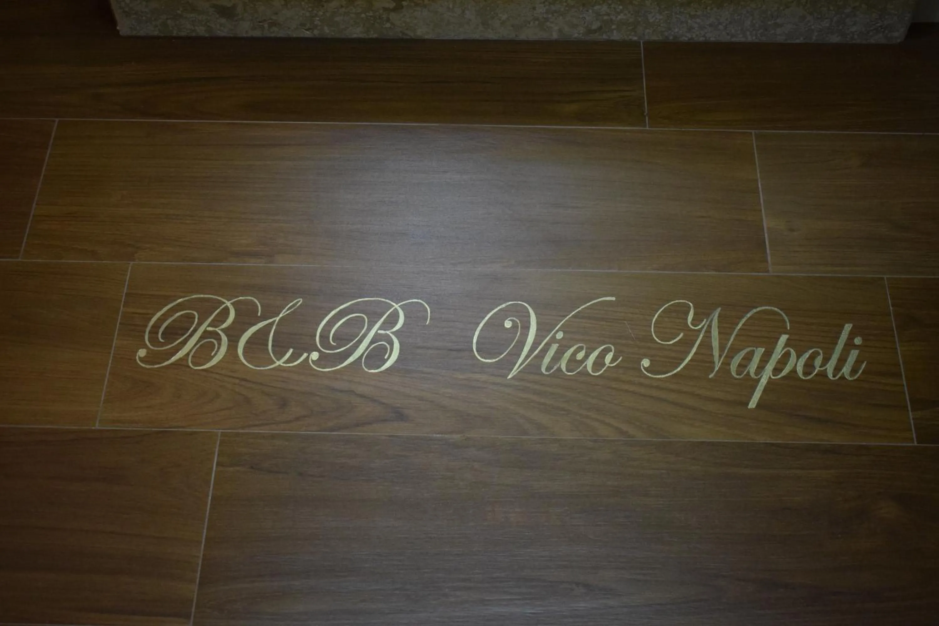 Property logo or sign in B&B Vico Napoli Salento