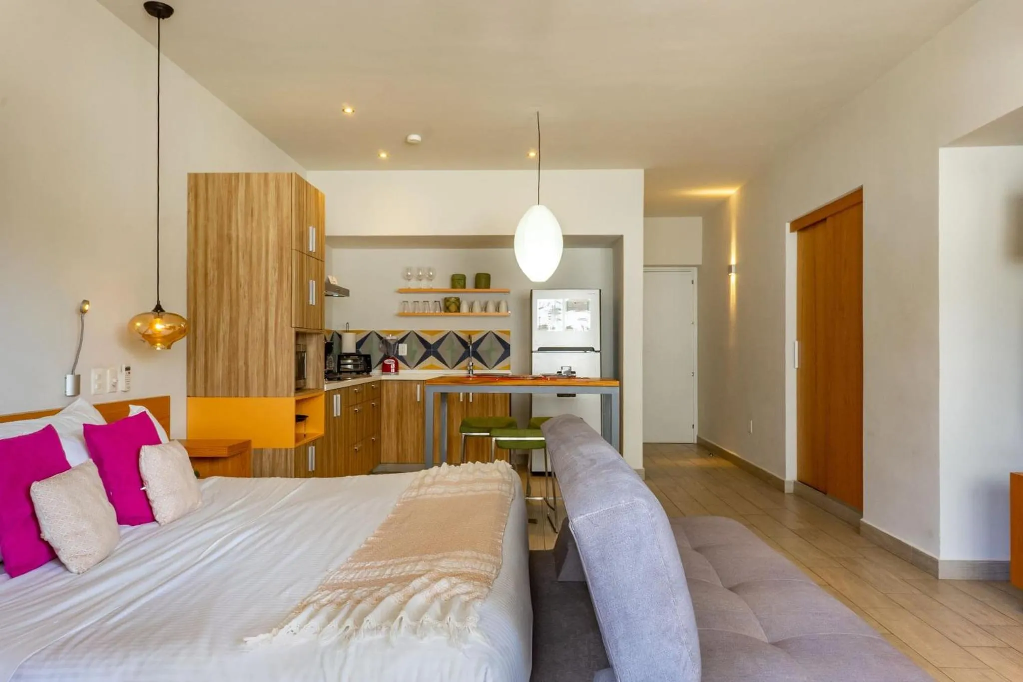 Bed in Opal Suites Apartments