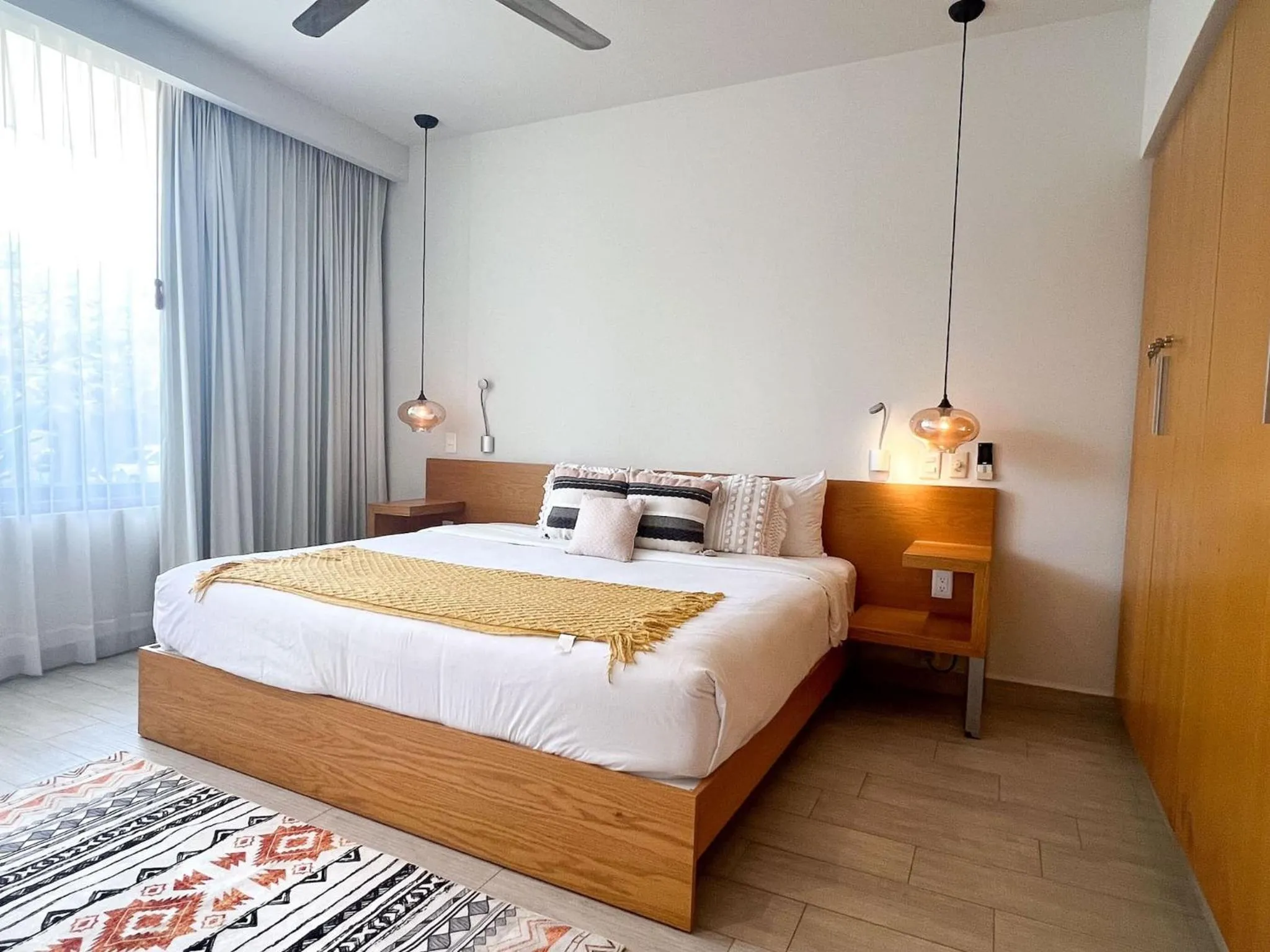 Bed in Opal Suites Apartments