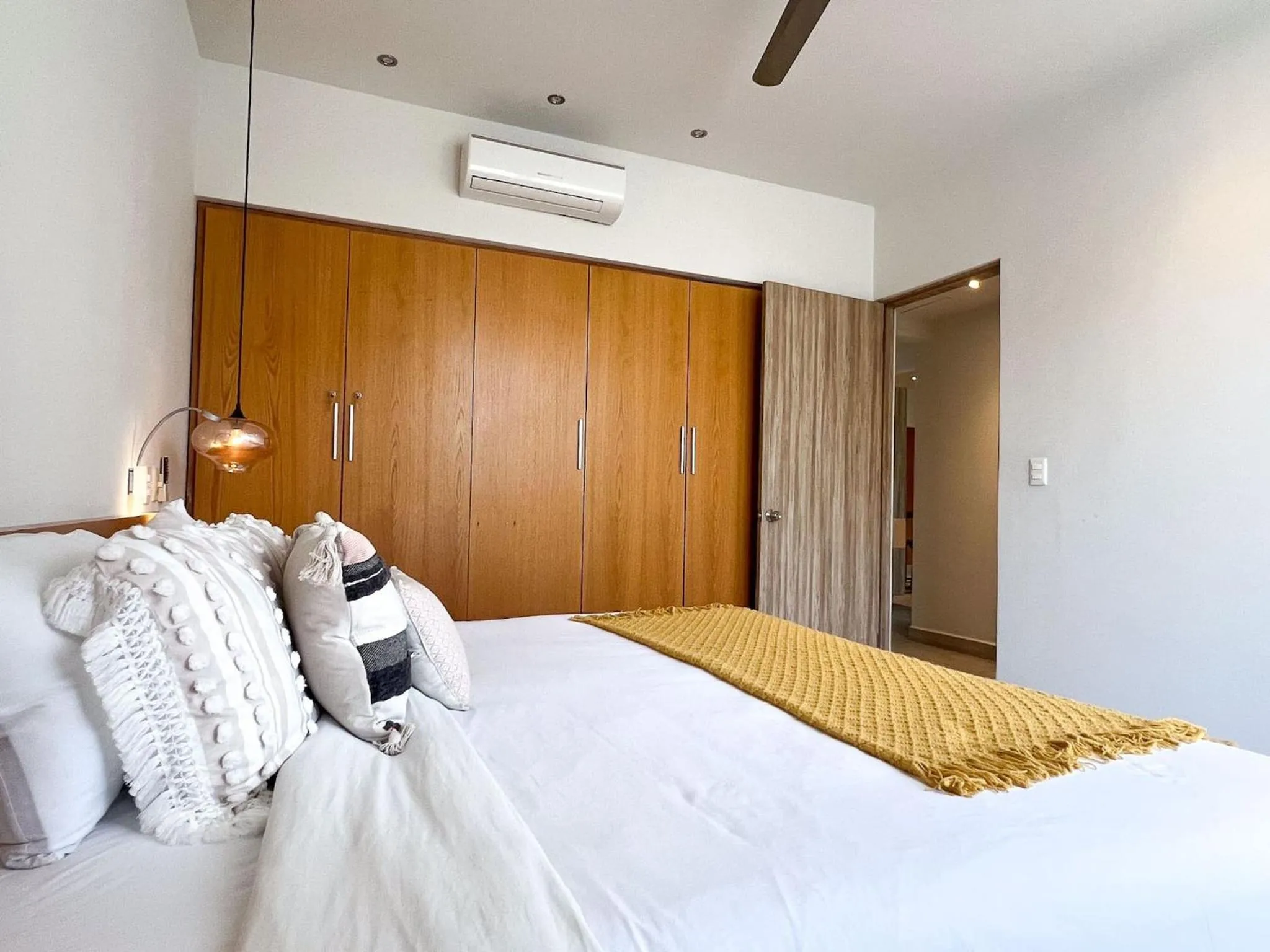 Bed in Opal Suites Apartments