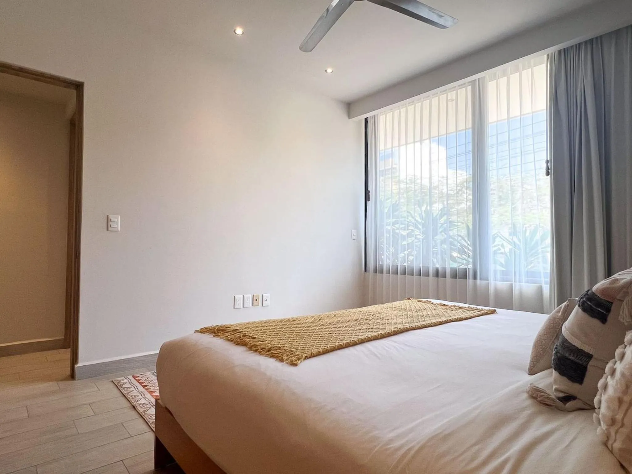 Bed in Opal Suites Apartments