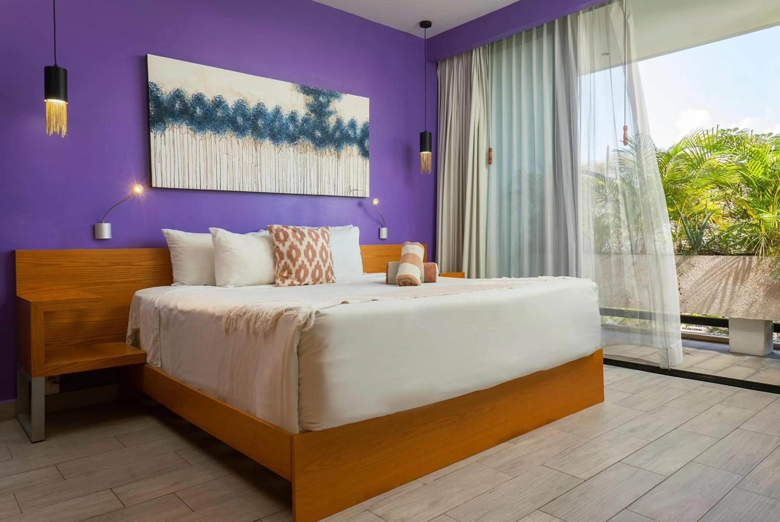 Bed in Opal Suites Apartments