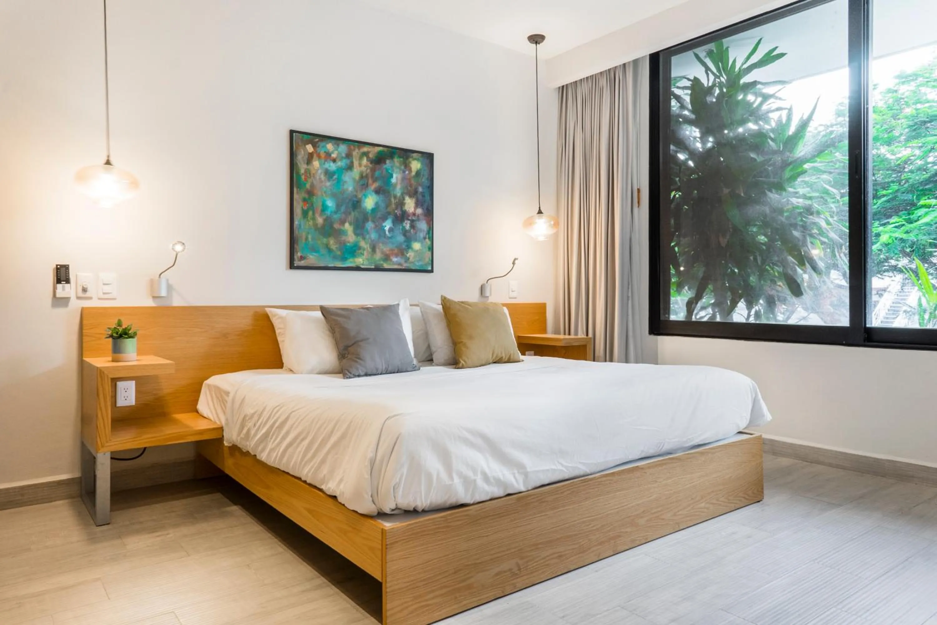 Bed in Opal Suites Apartments