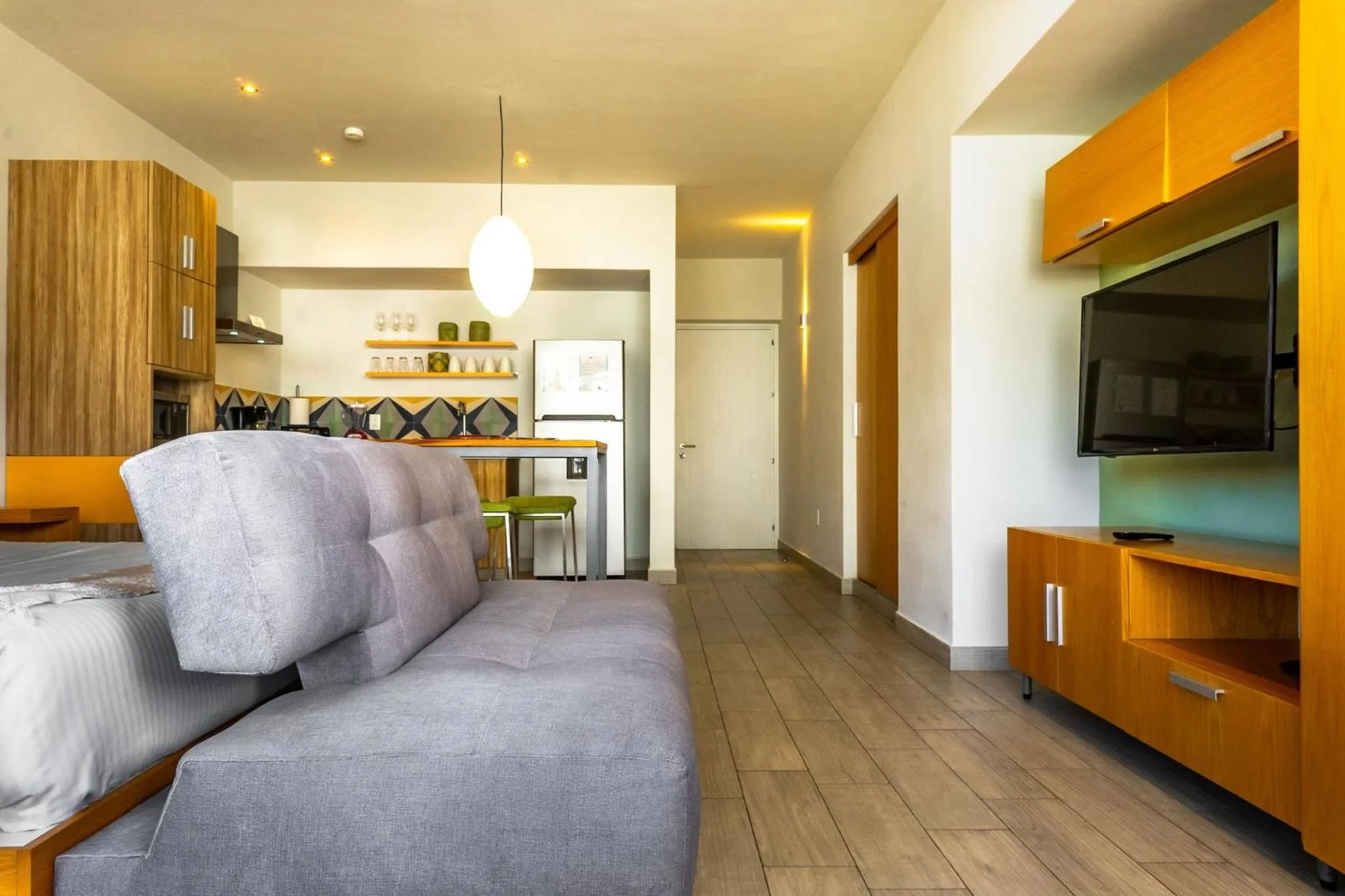 Bed in Opal Suites Apartments