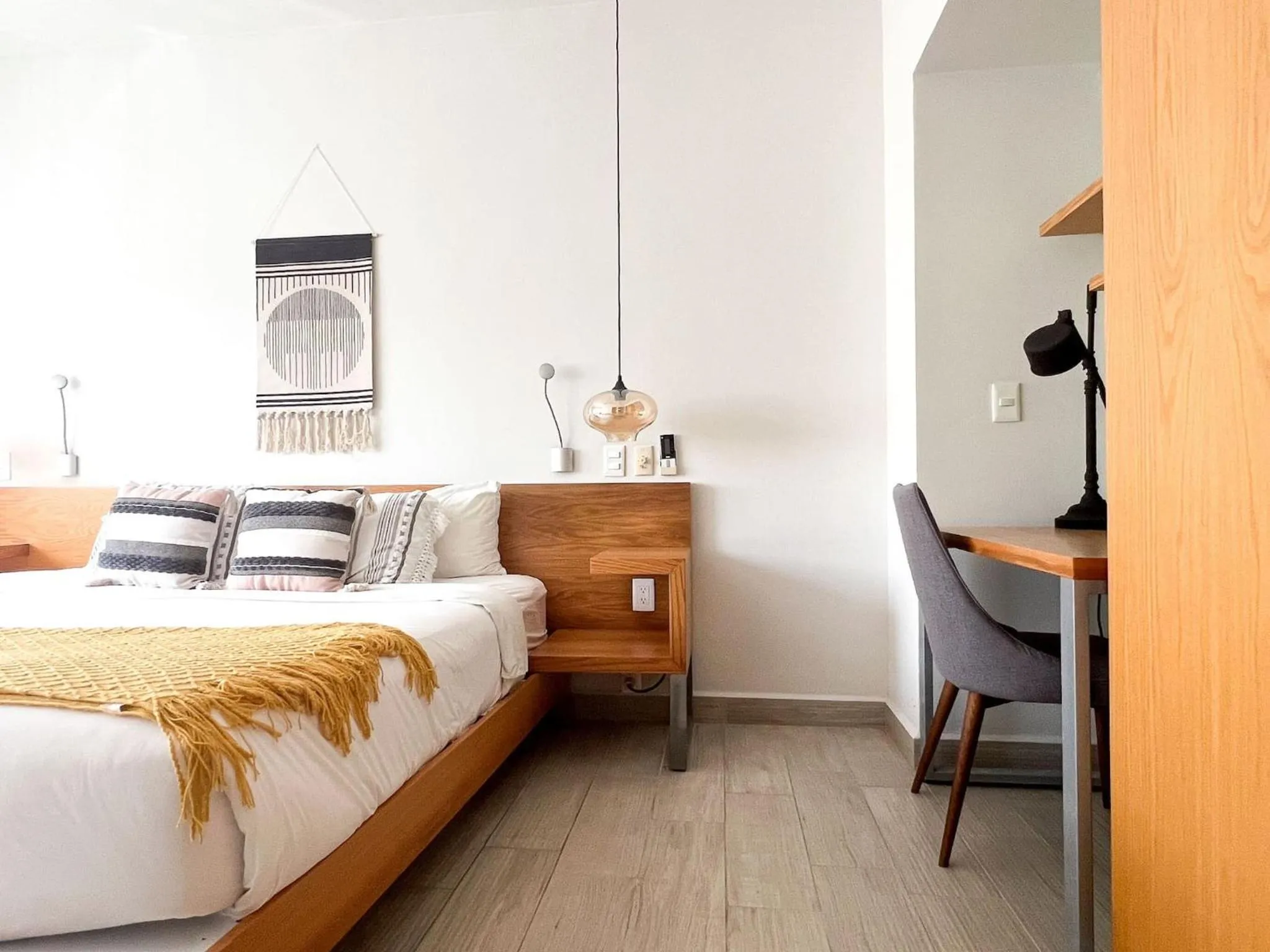 Bed in Opal Suites Apartments