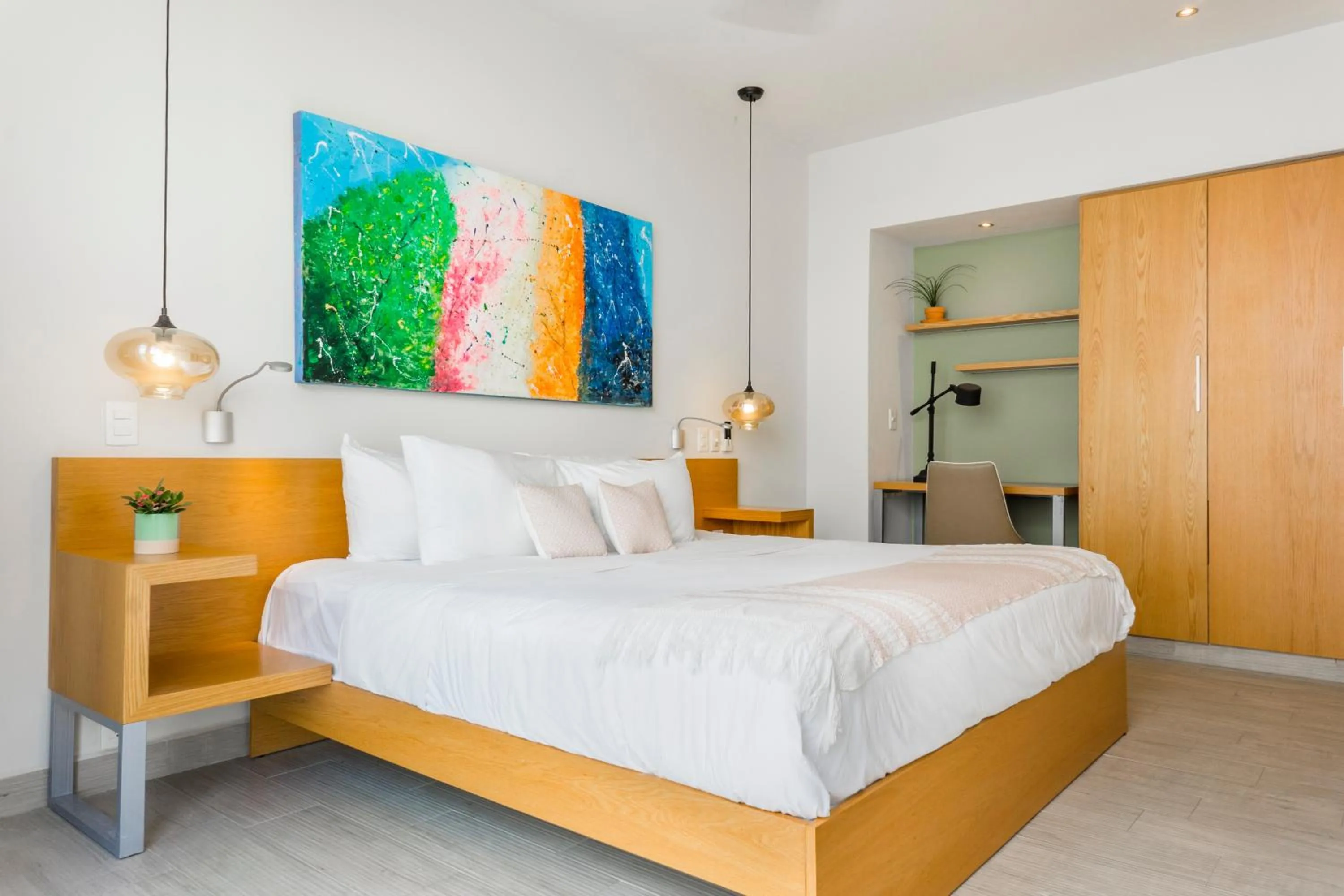 Bed in Opal Suites Apartments