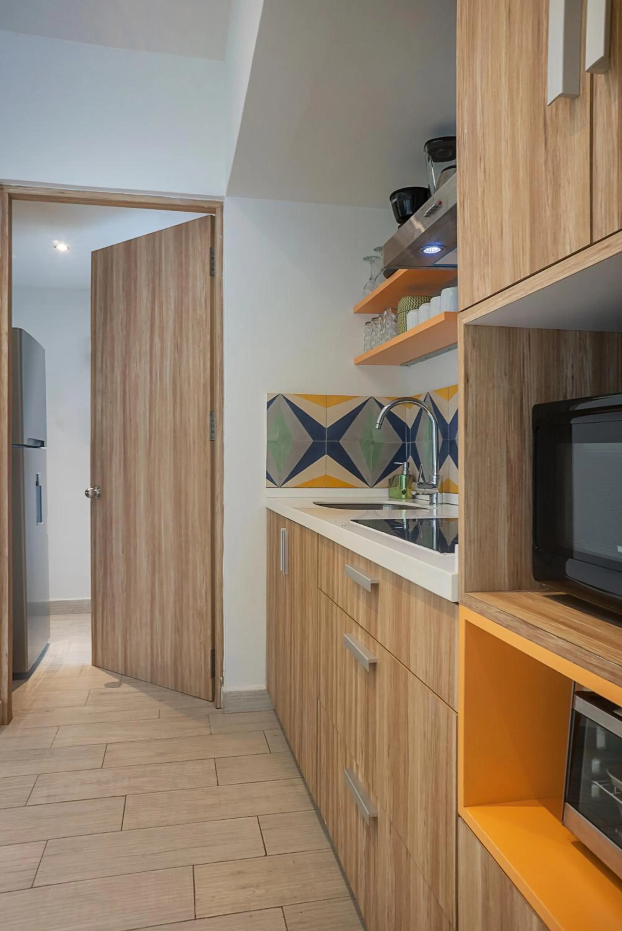 kitchen in Opal Suites Apartments