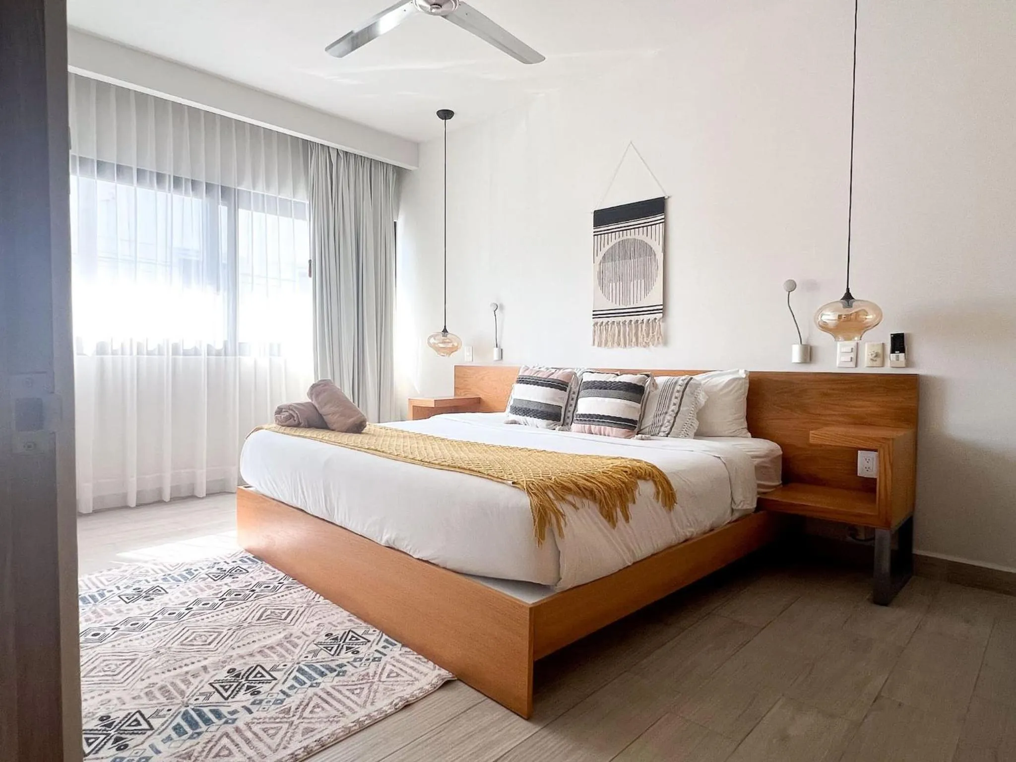 Bed in Opal Suites Apartments