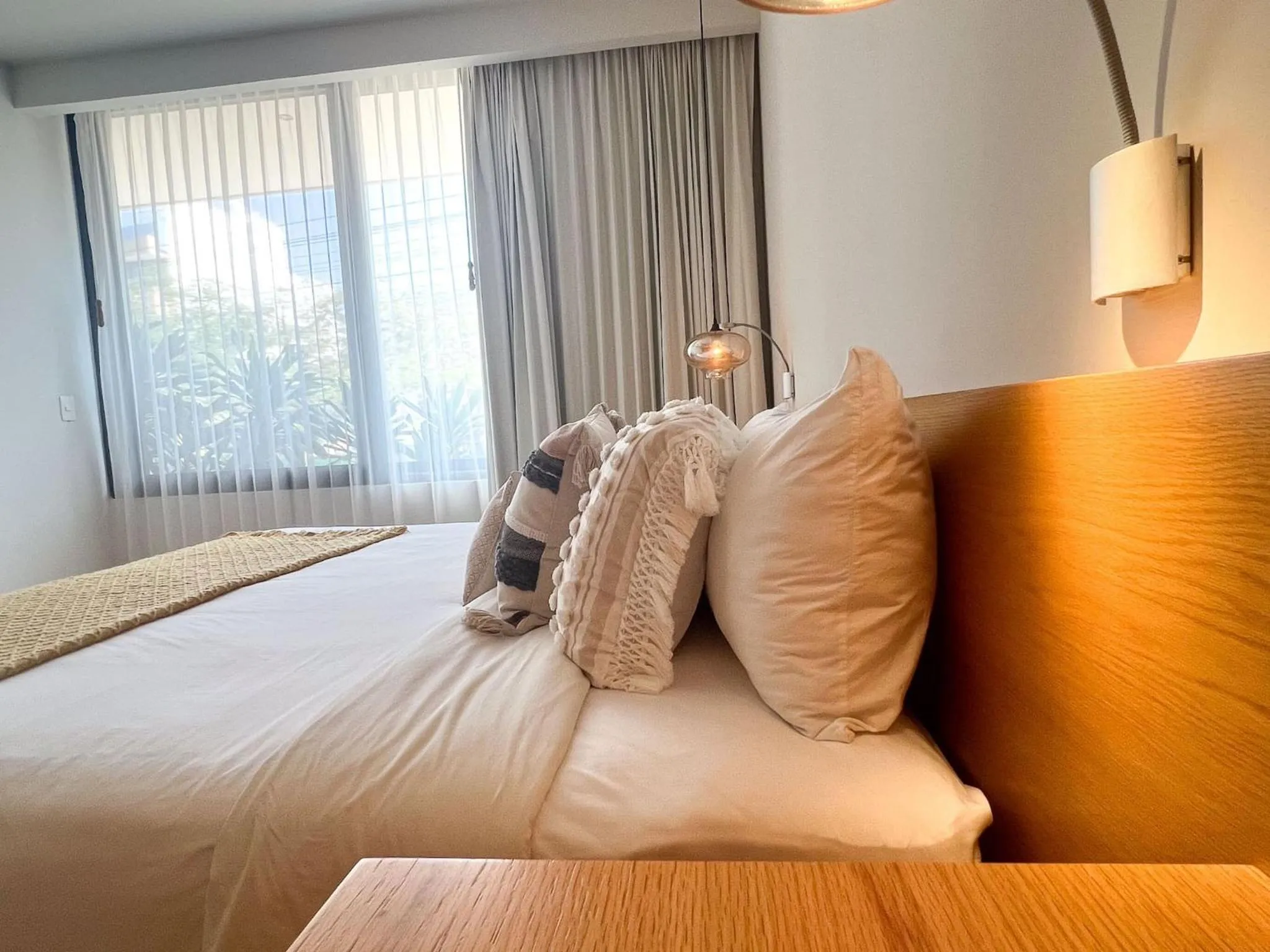 Bed in Opal Suites Apartments