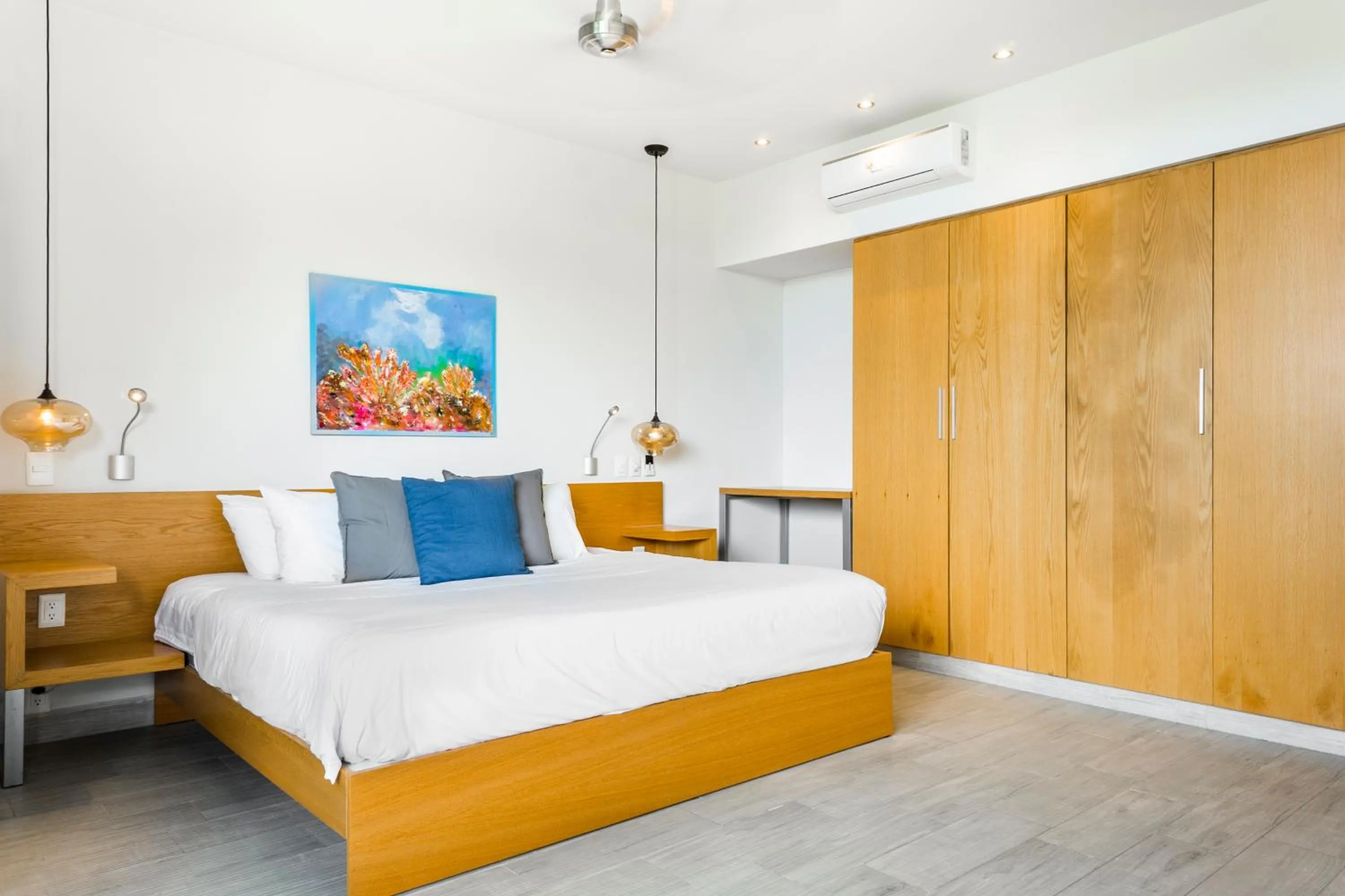 Bed in Opal Suites Apartments