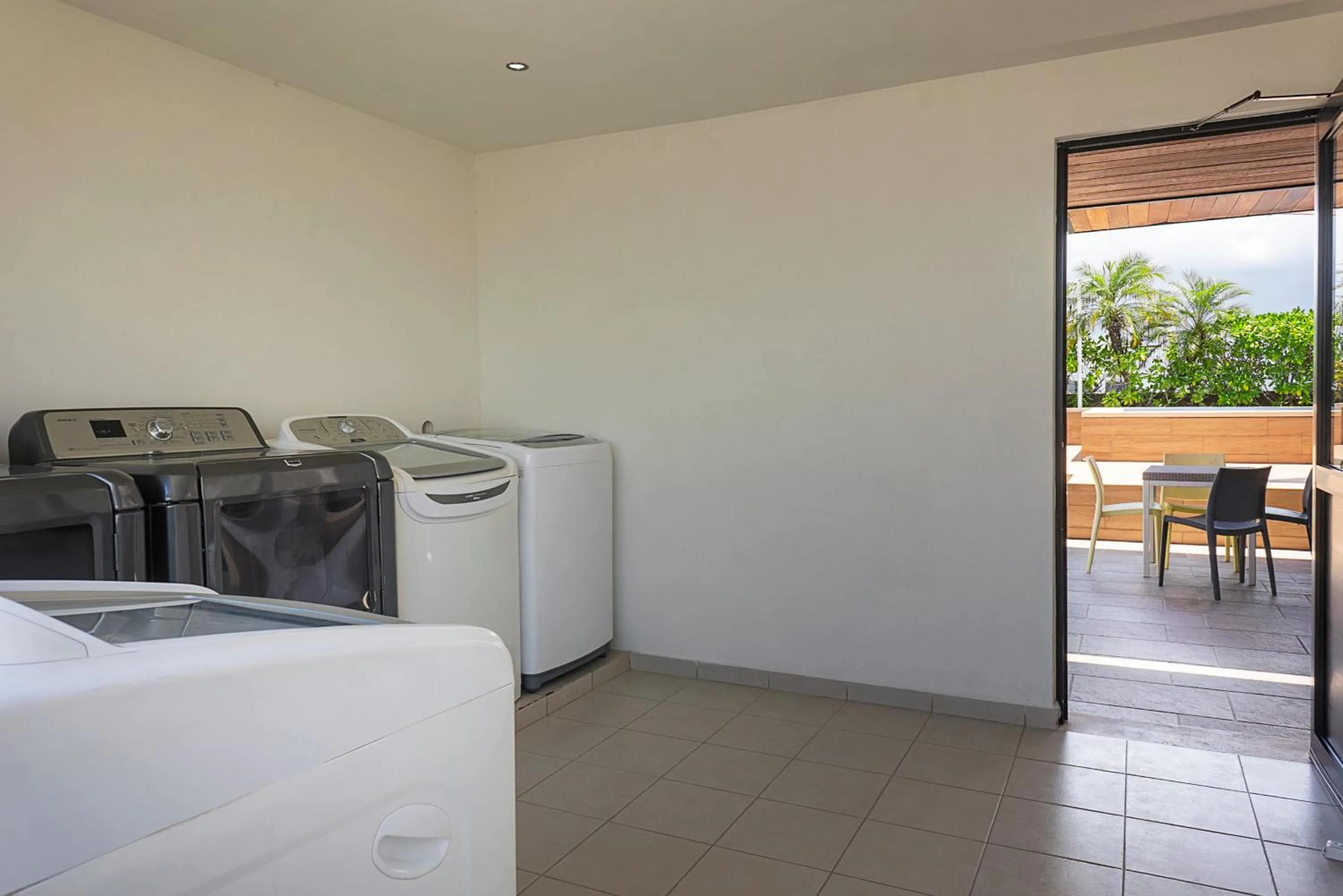 laundry in Opal Suites Apartments