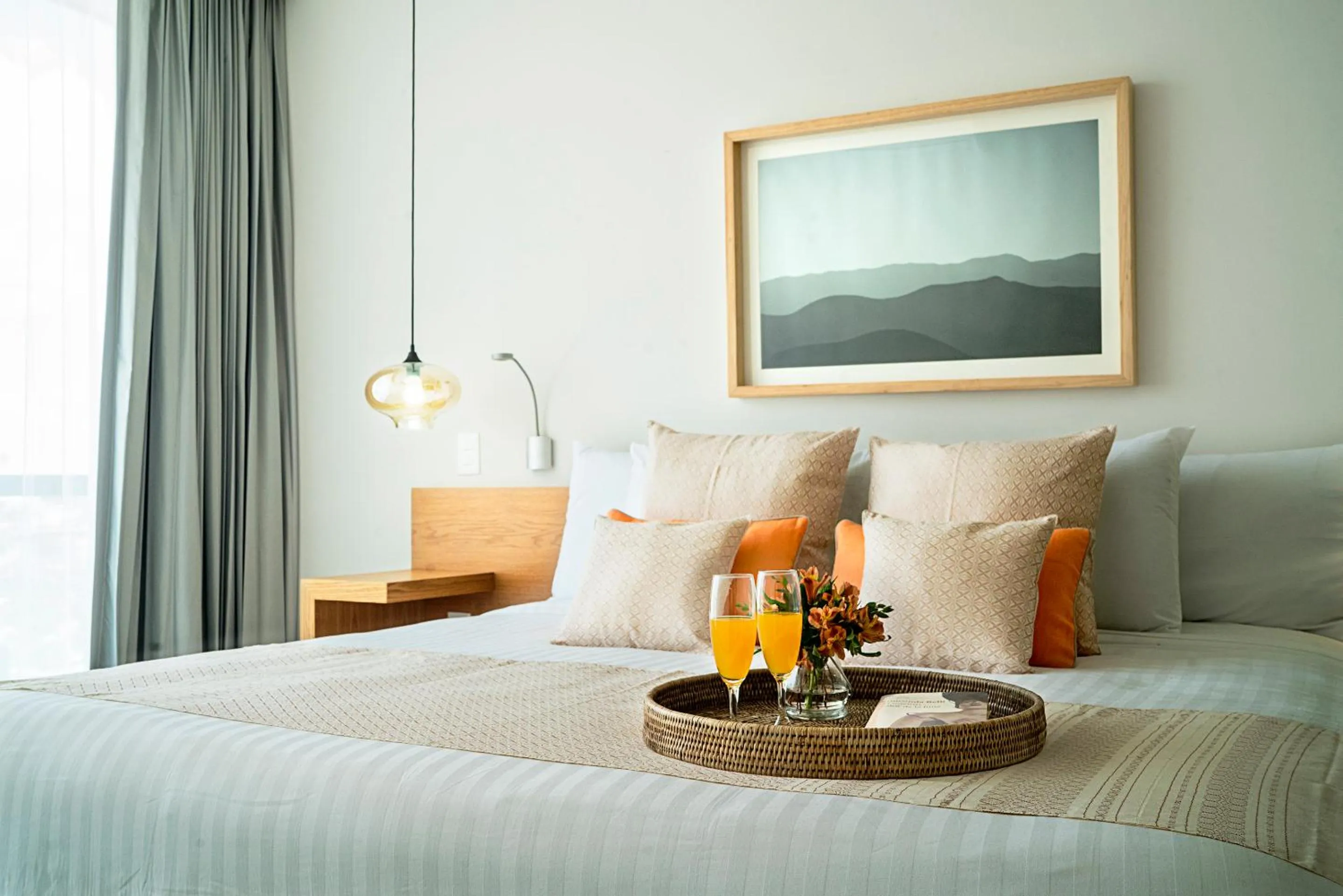 Bed in Opal Suites Apartments