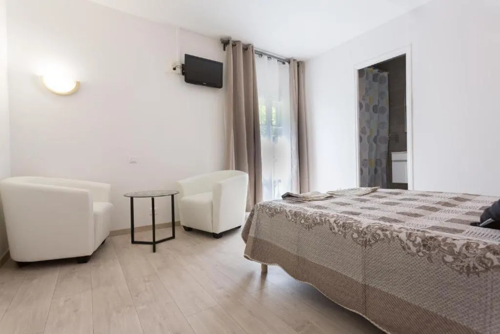 Bed in Hotel Alizéa