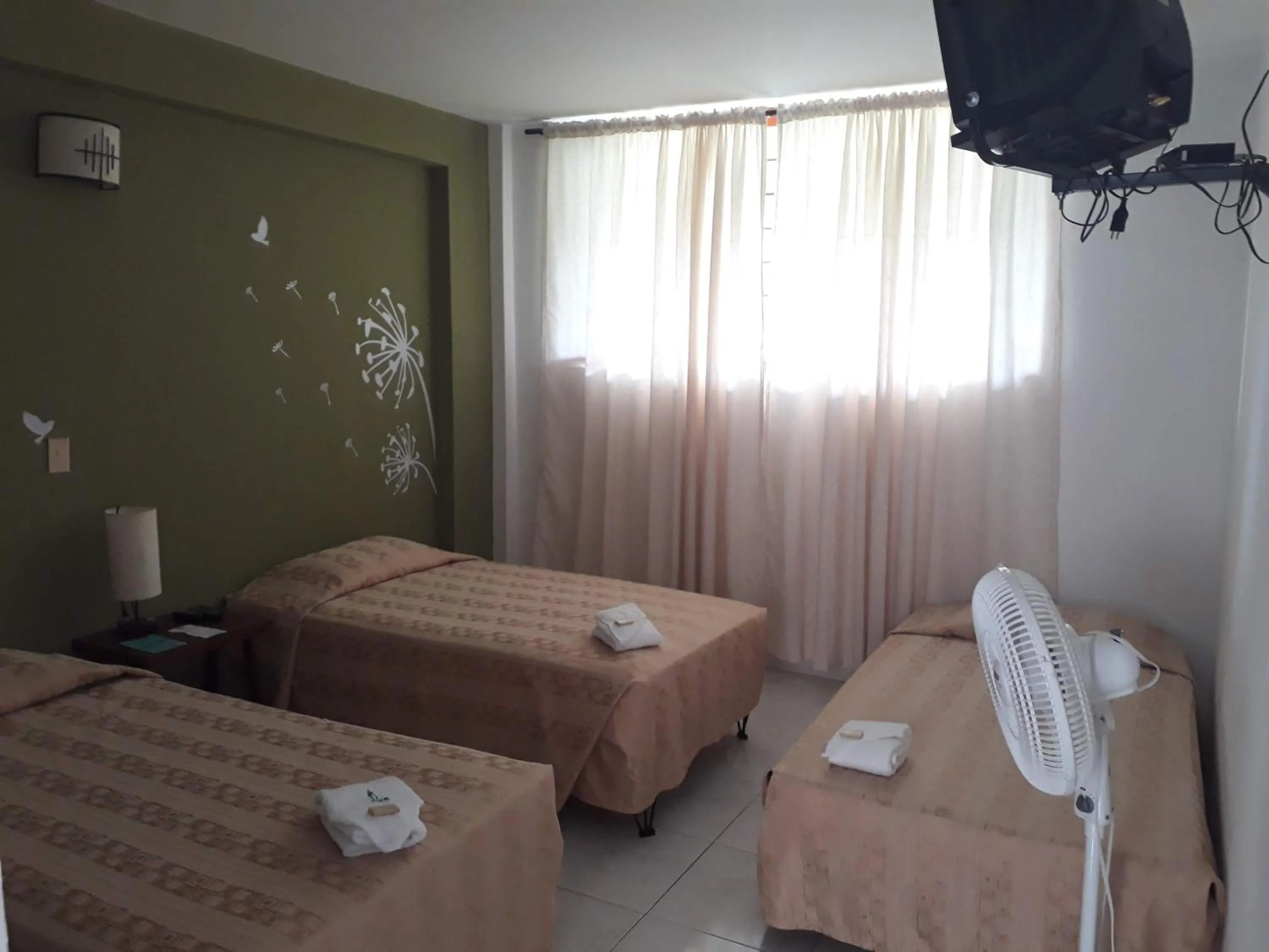 Triple Room in Imca Hotel