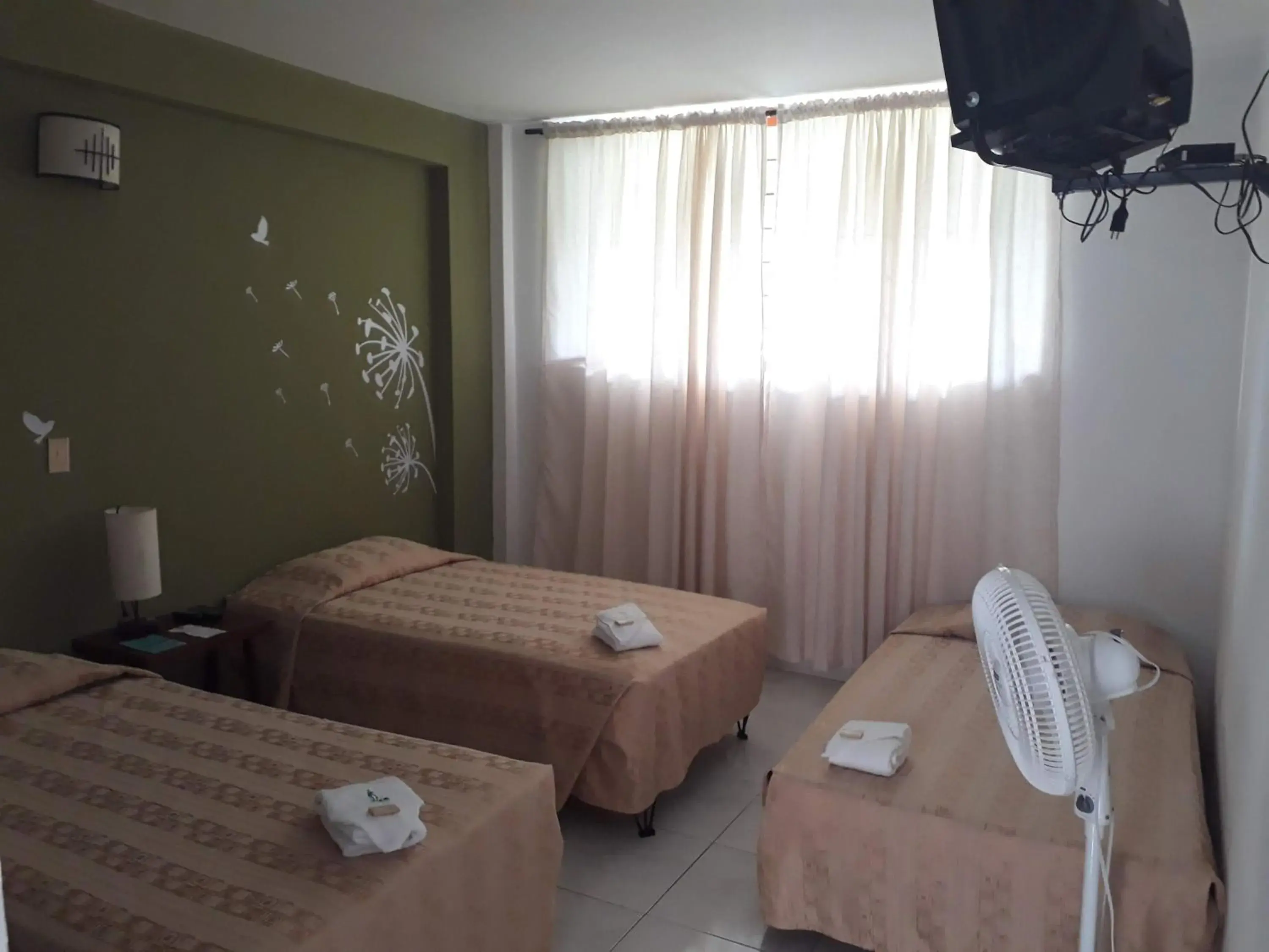 Triple Room in Imca Hotel Triple Room in Imca Hotel