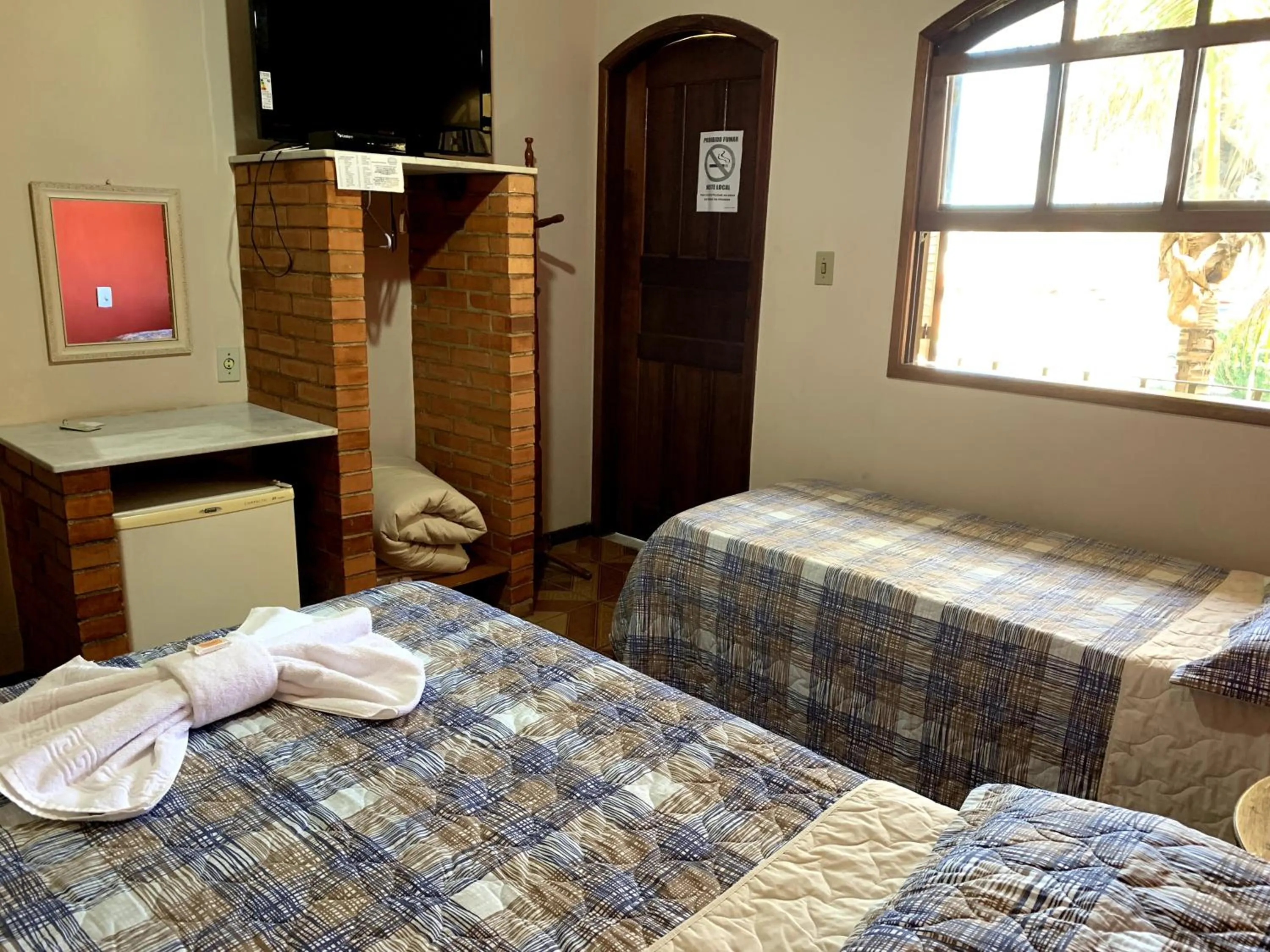 Bed in Pousada Por do Sol