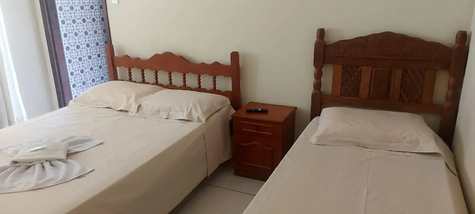 Standard Triple Room - single occupancy in Pousada Por do Sol Standard Triple Room - single occupancy in Pousada Por do Sol