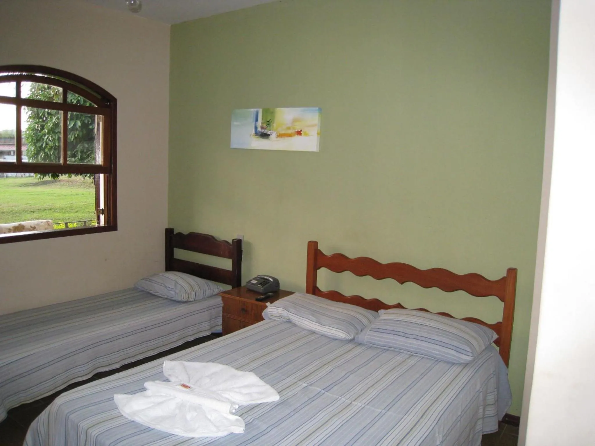 Bed in Pousada Por do Sol