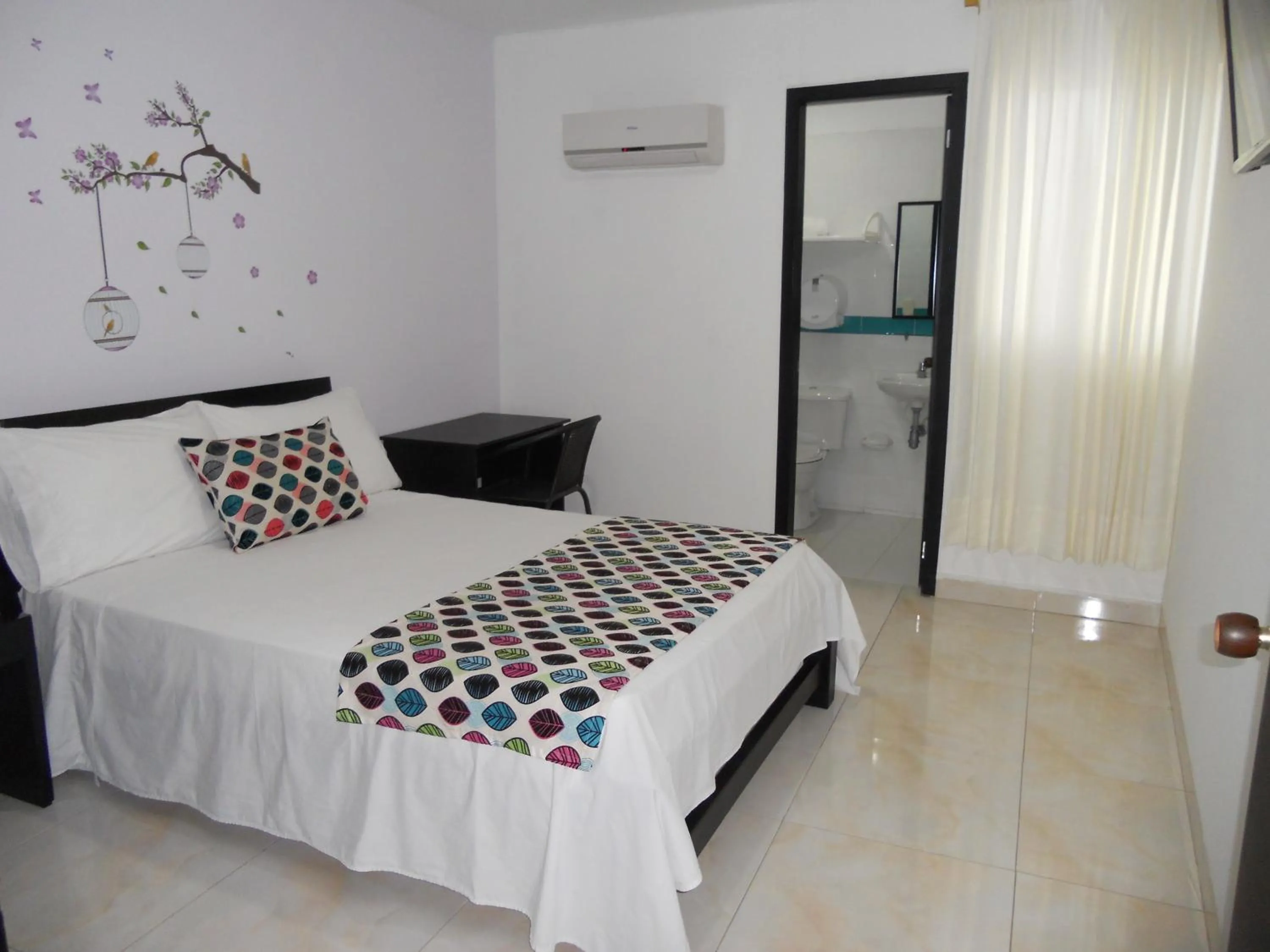 Photo of the whole room, Bed in Hotel Cosmos Sincelejo