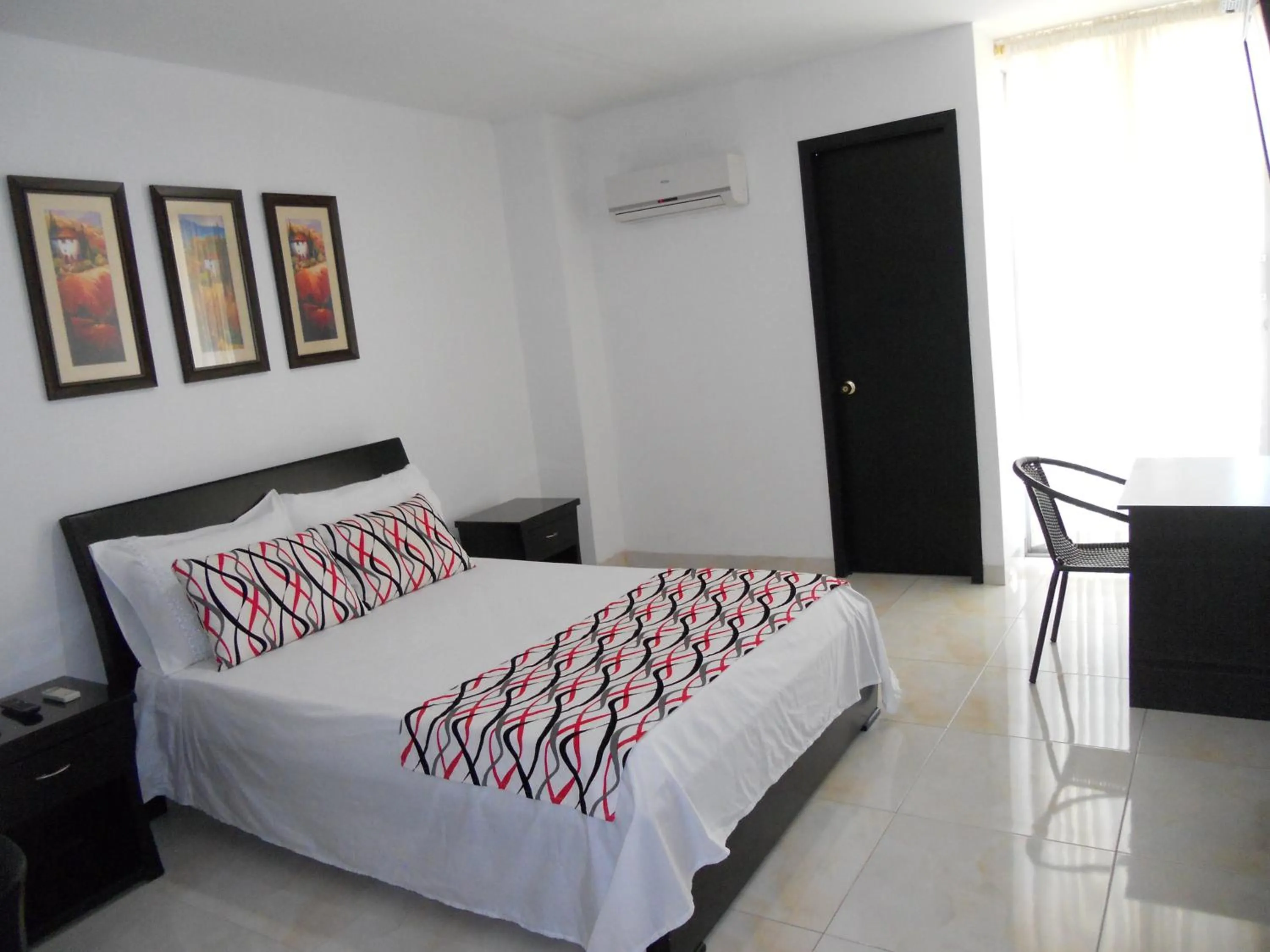 Photo of the whole room, Bed in Hotel Cosmos Sincelejo
