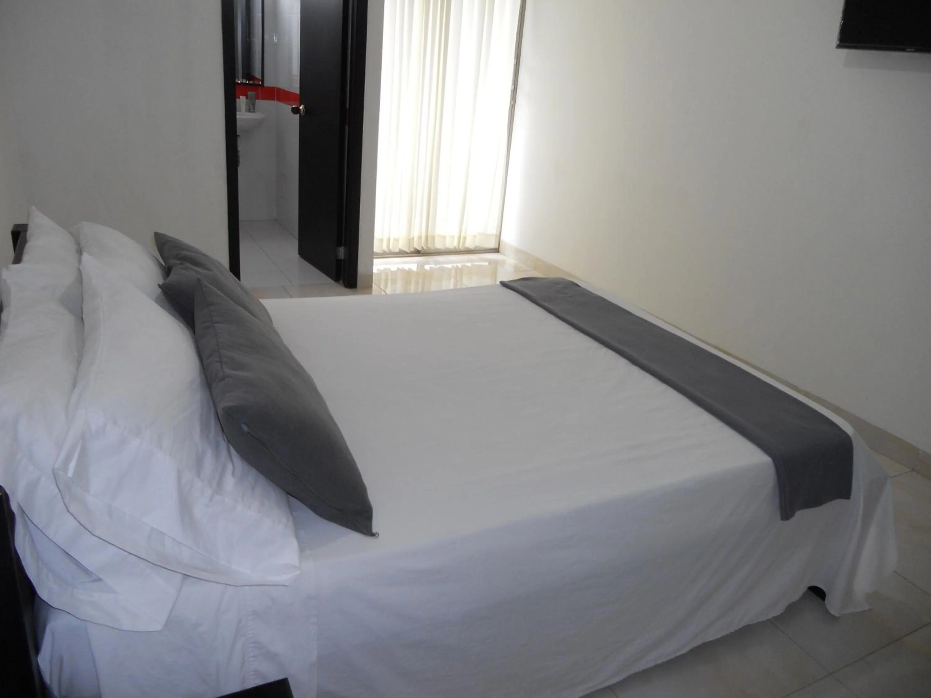 Photo of the whole room, Bed in Hotel Cosmos Sincelejo