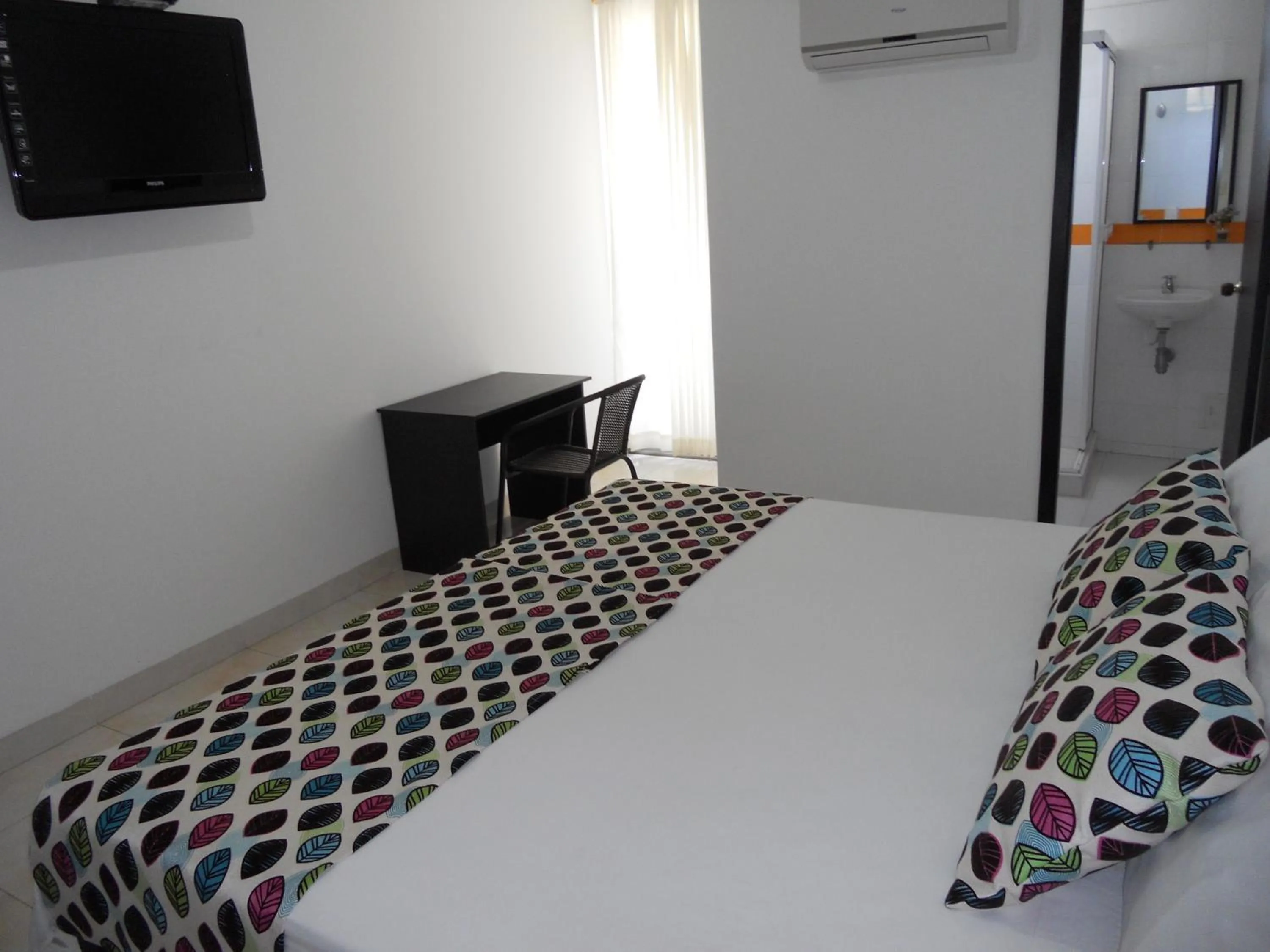 Photo of the whole room, Bed in Hotel Cosmos Sincelejo