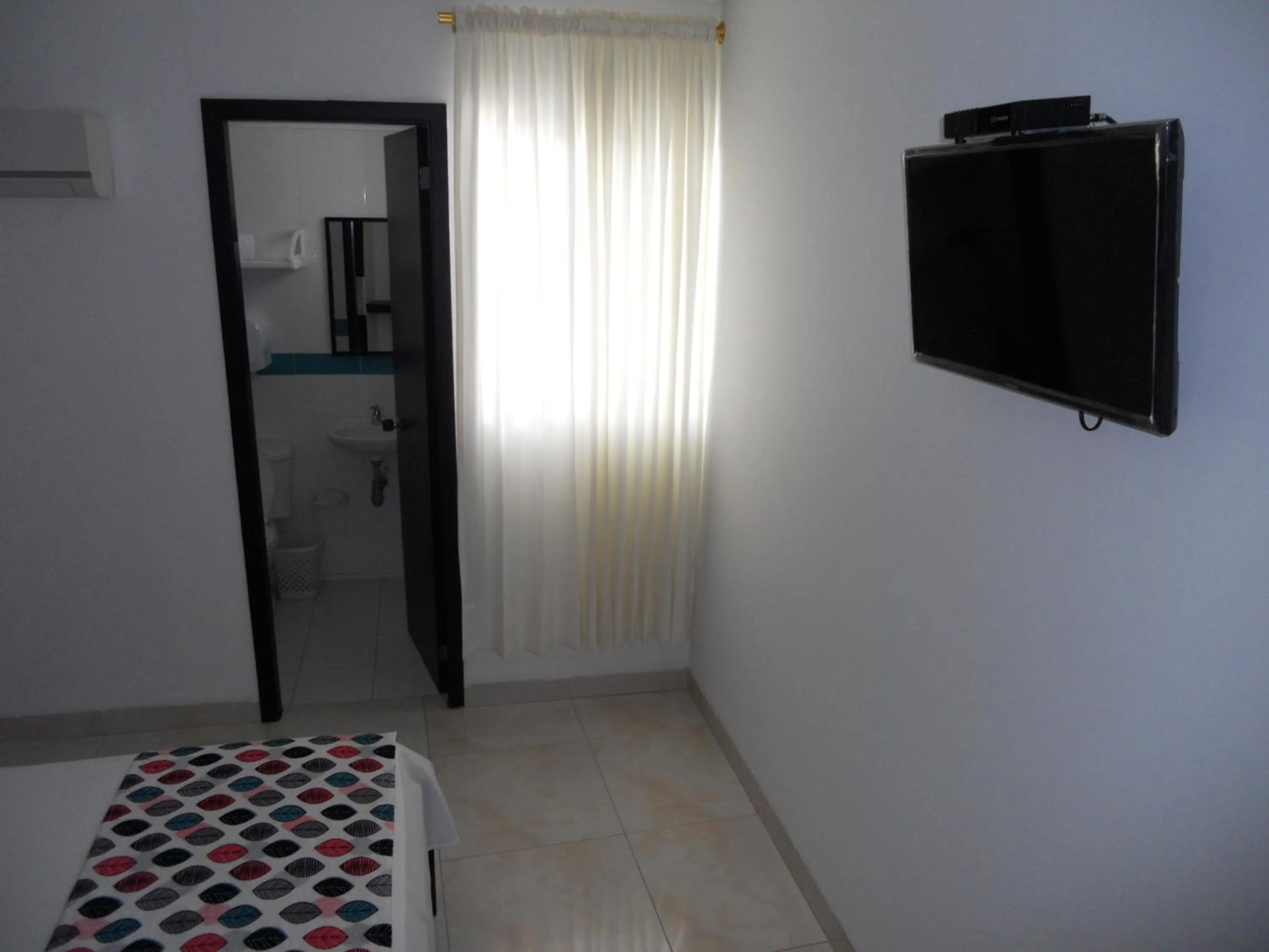 Photo of the whole room, Bed in Hotel Cosmos Sincelejo