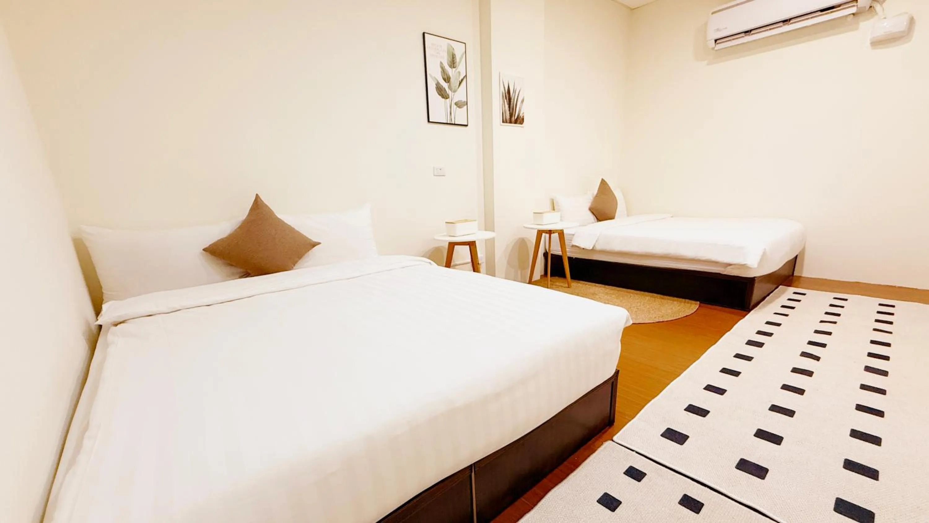 Bed in 台東普悠瑪風格旅店民宿編號2280號 丨娜娜雅筑民宿編號984號