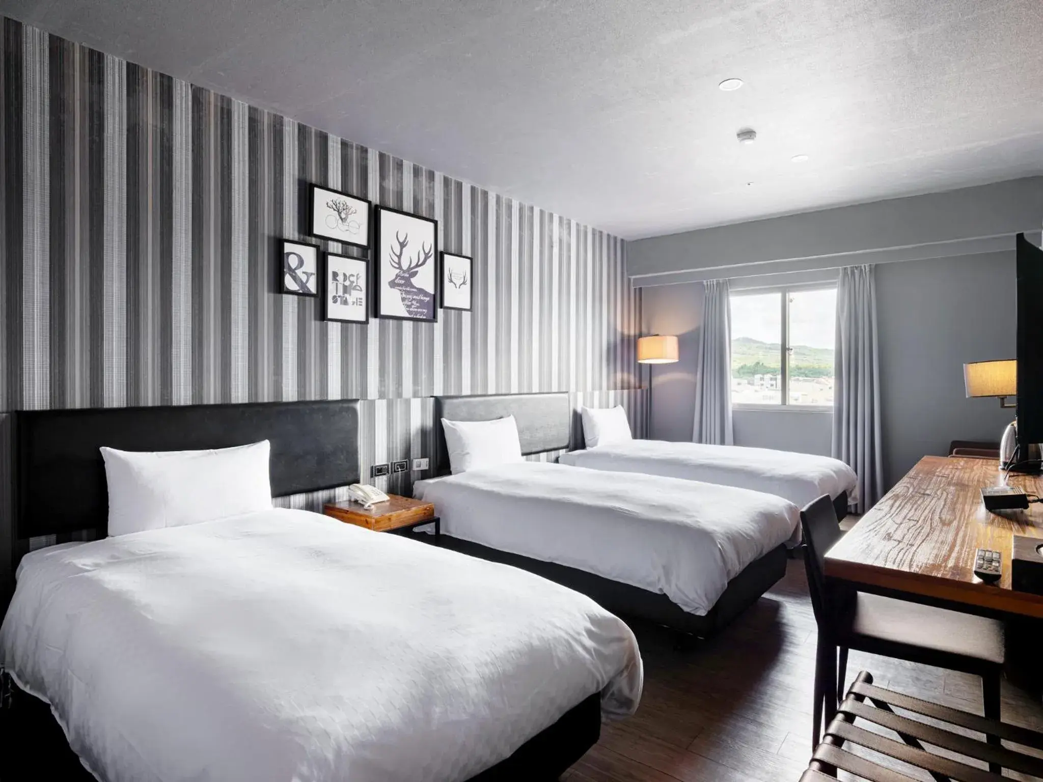 Photo of the whole room, Bed in GUIDE HOTEL Kenting Resort Photo of the whole room, Bed in GUIDE HOTEL Kenting Resort