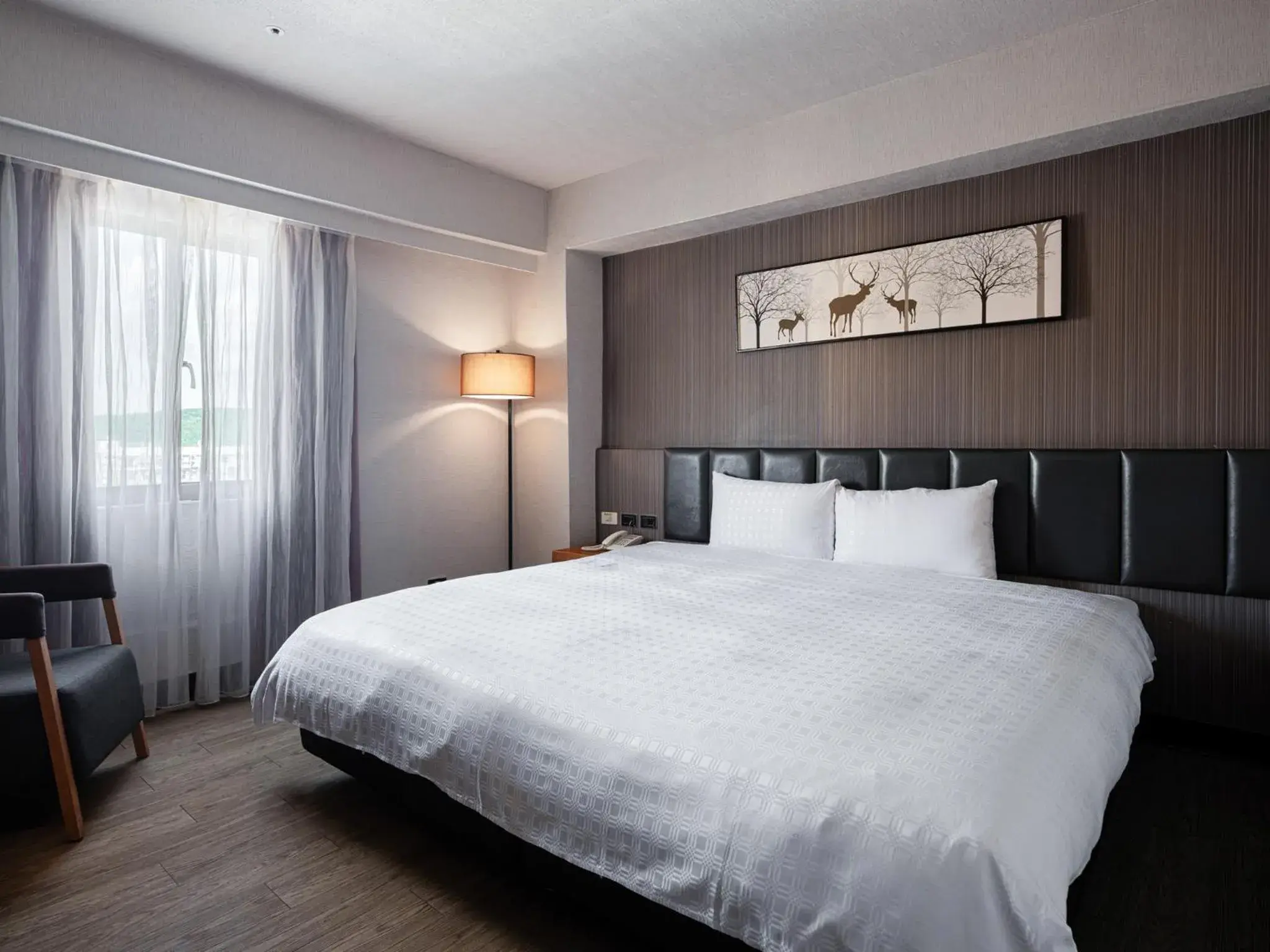 Photo of the whole room, Bed in GUIDE HOTEL Kenting Resort Photo of the whole room, Bed in GUIDE HOTEL Kenting Resort