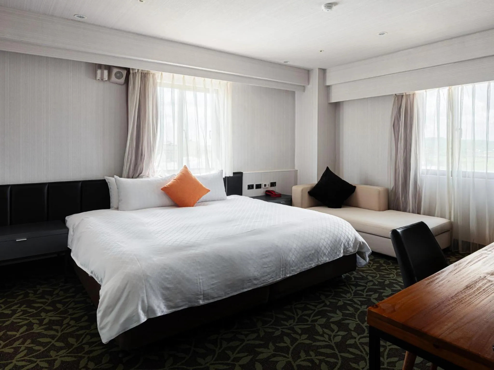 Photo of the whole room, Bed in GUIDE HOTEL Kenting Resort