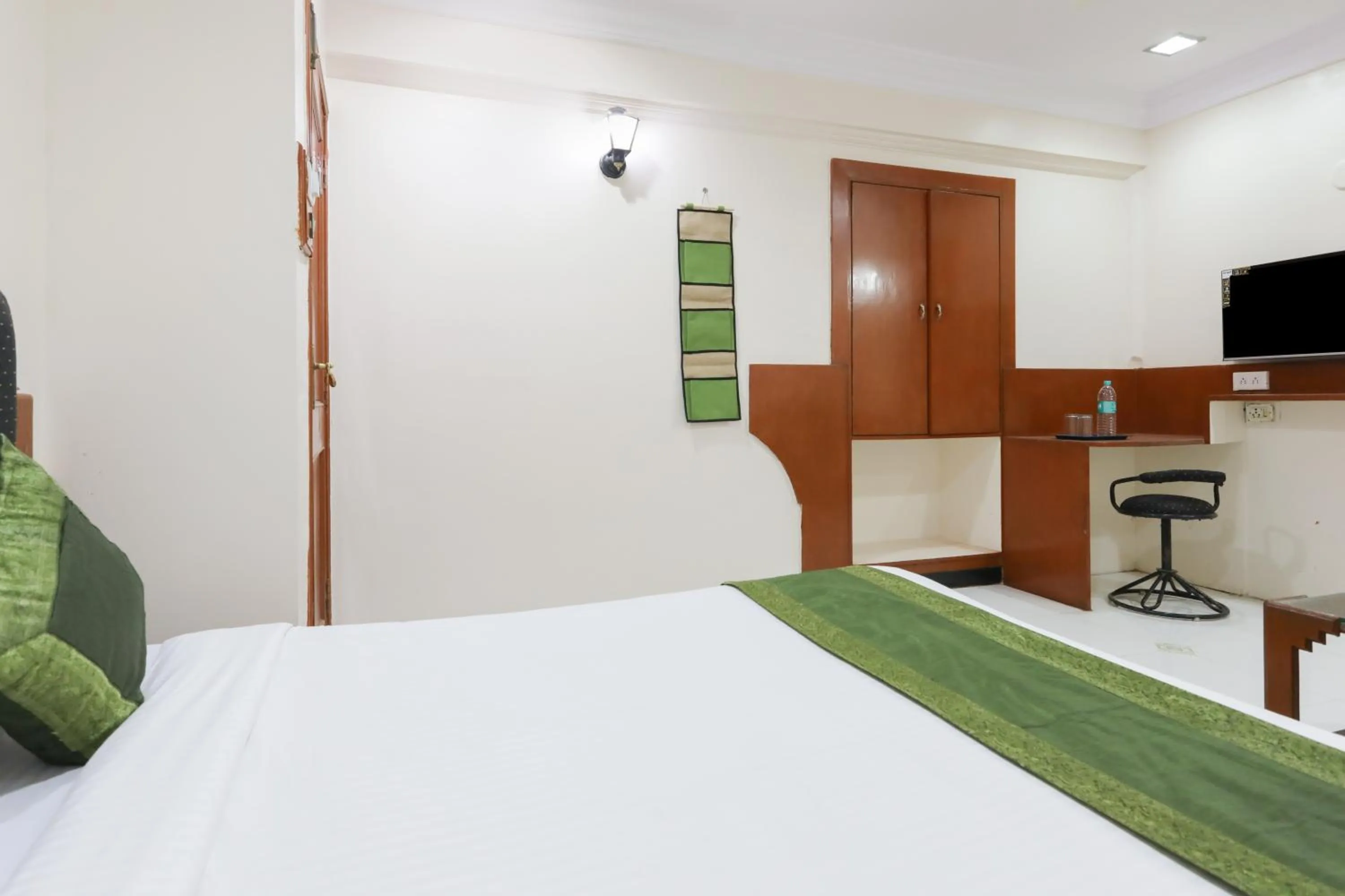 Bed in Treebo Omni Palace