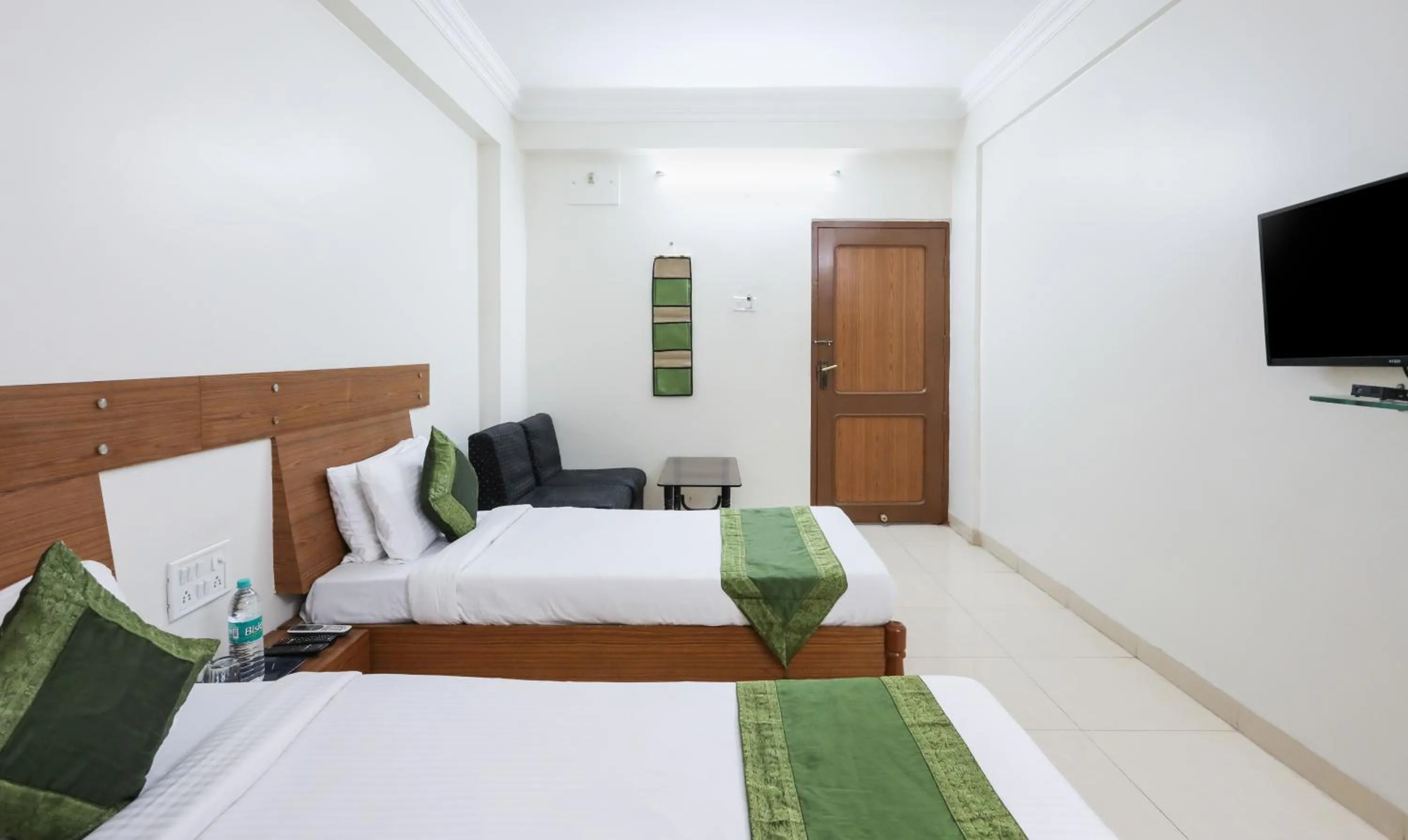 Bed in Treebo Omni Palace