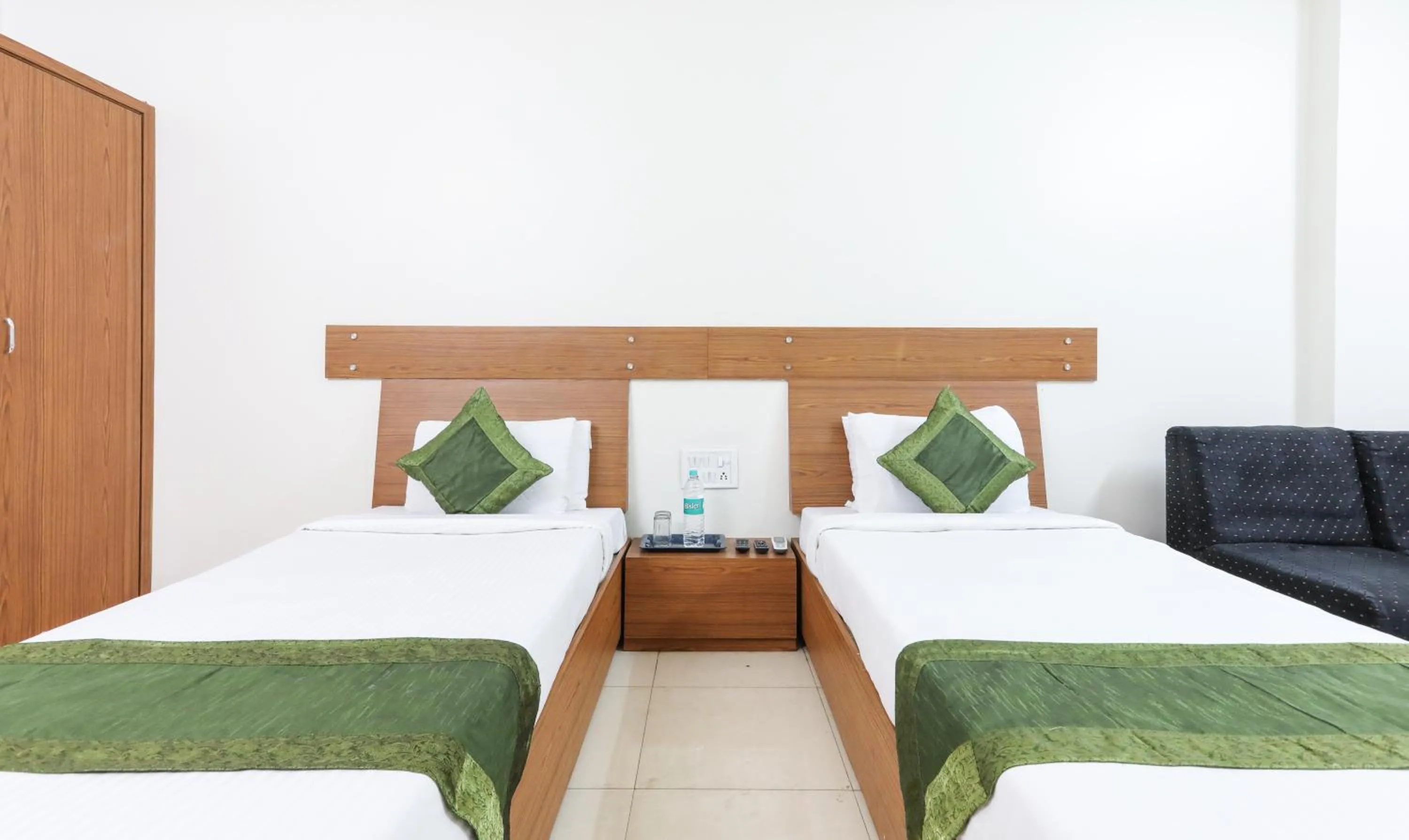 Bed in Treebo Omni Palace