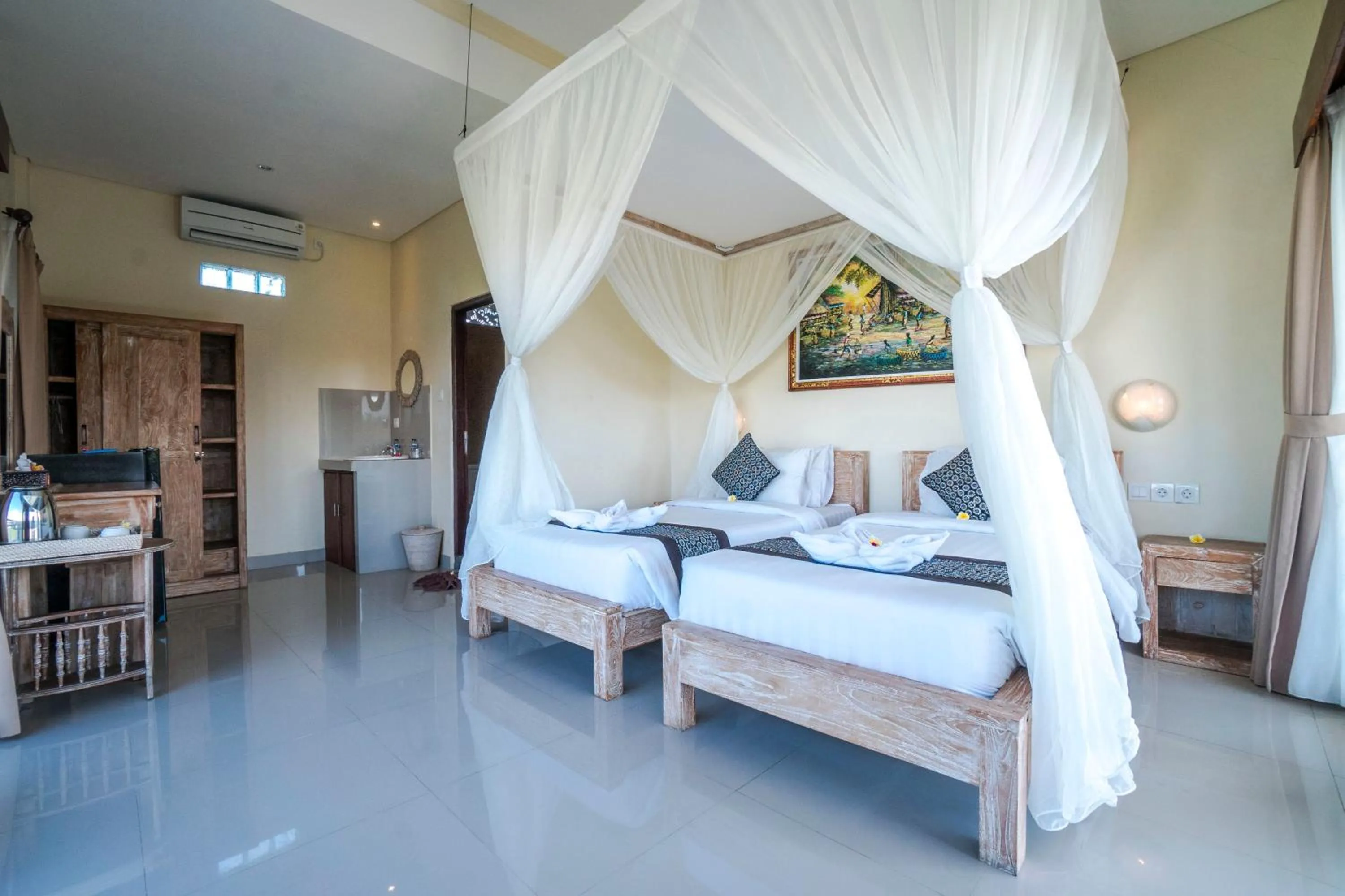Photo of the whole room, Bed in Adi Bisma Inn by Mahaputra-CHSE Certified