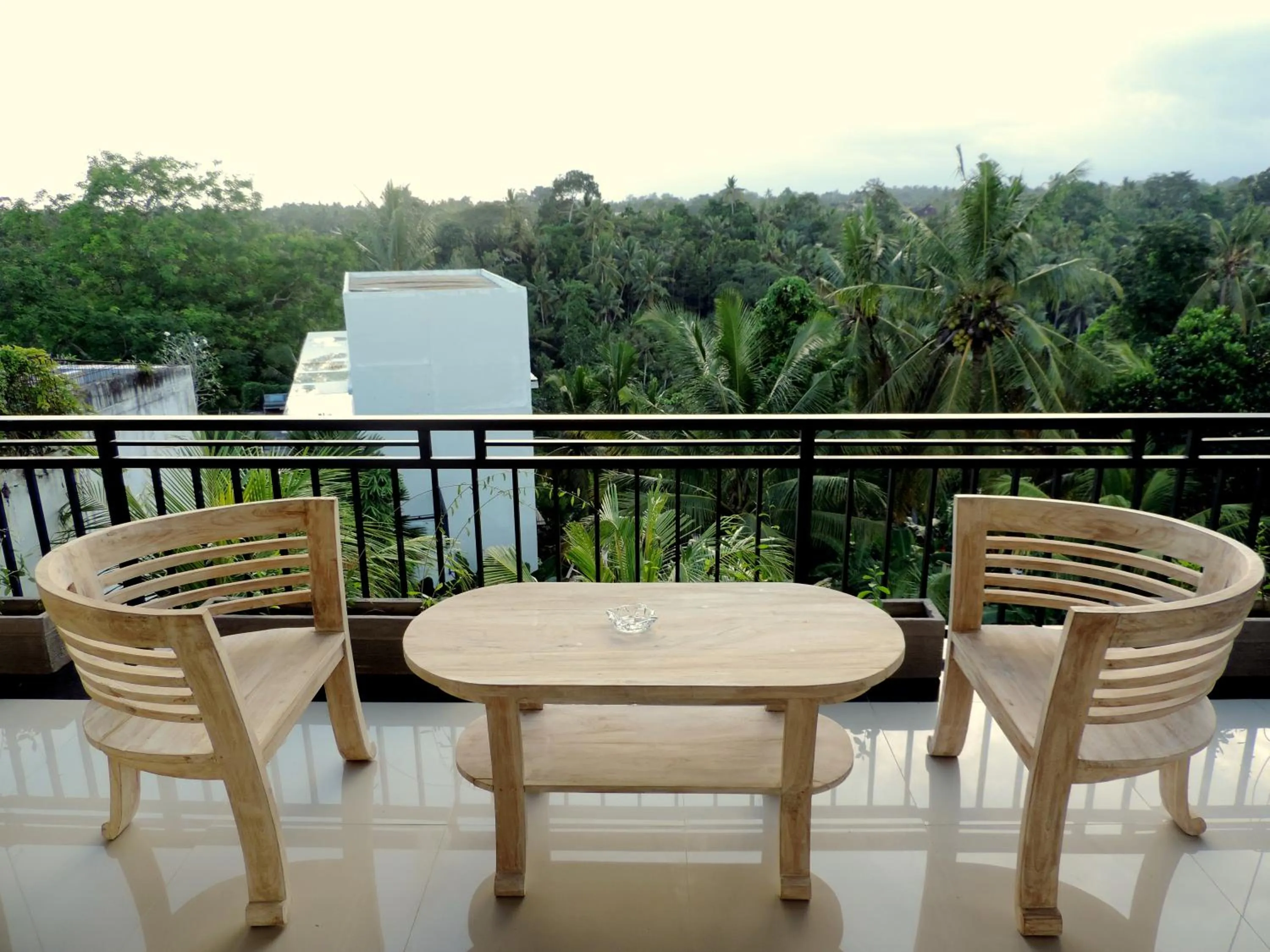 Balcony/Terrace in Adi Bisma Inn by Mahaputra-CHSE Certified