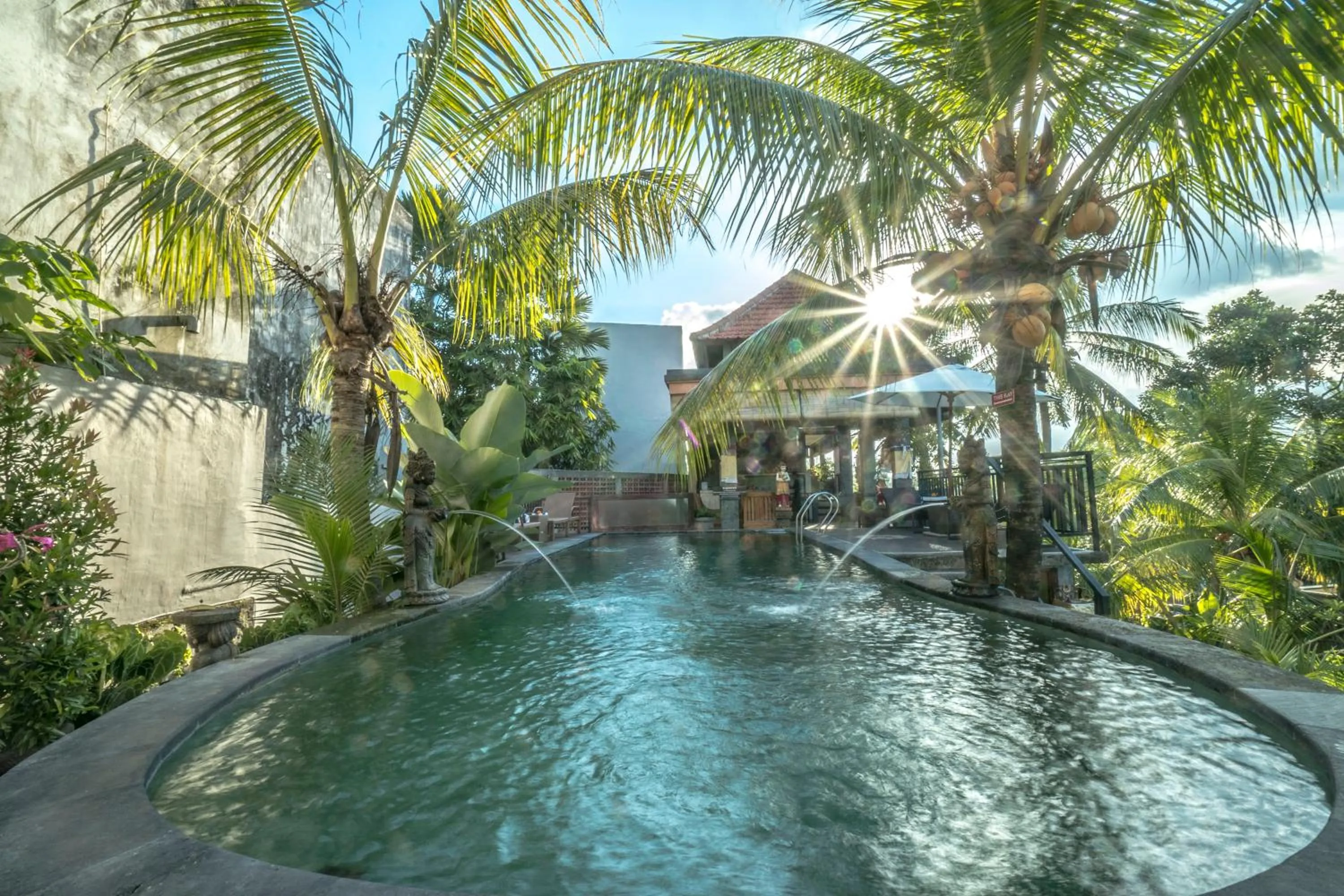 Swimming pool in Adi Bisma Inn by Mahaputra-CHSE Certified