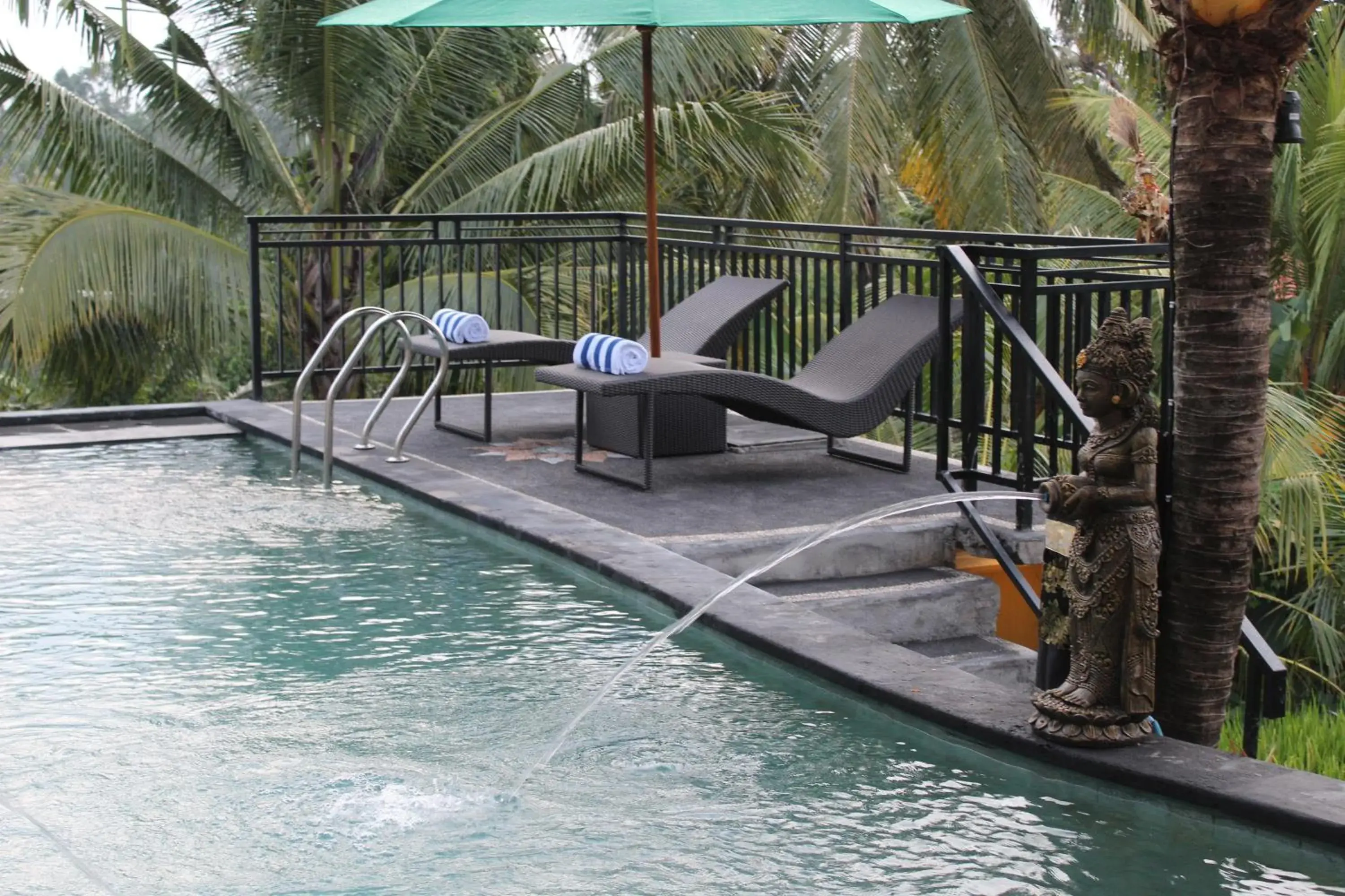 Pool view in Adi Bisma Inn by Mahaputra-CHSE Certified Pool view in Adi Bisma Inn by Mahaputra-CHSE Certified