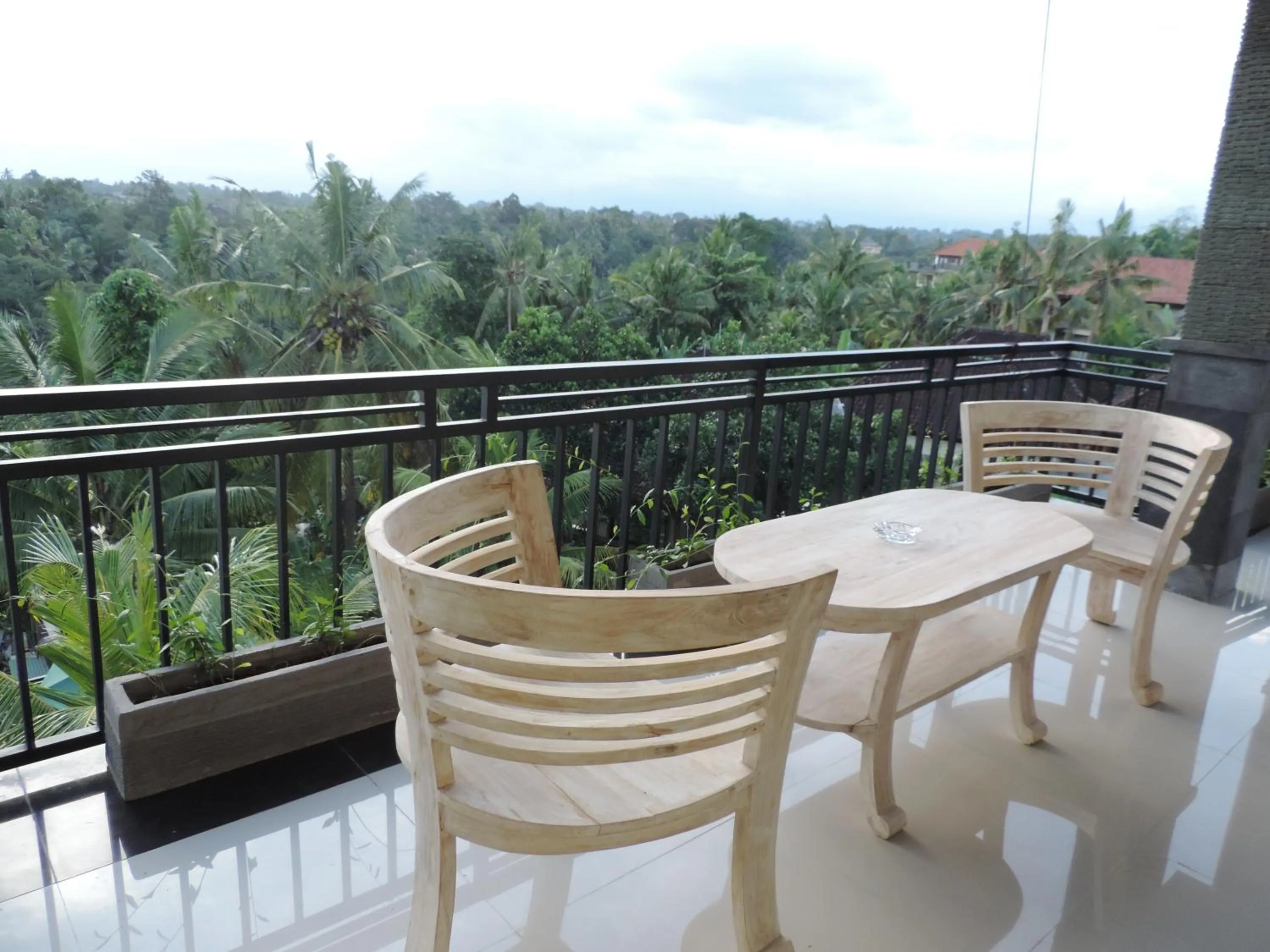 Balcony/Terrace in Adi Bisma Inn by Mahaputra-CHSE Certified