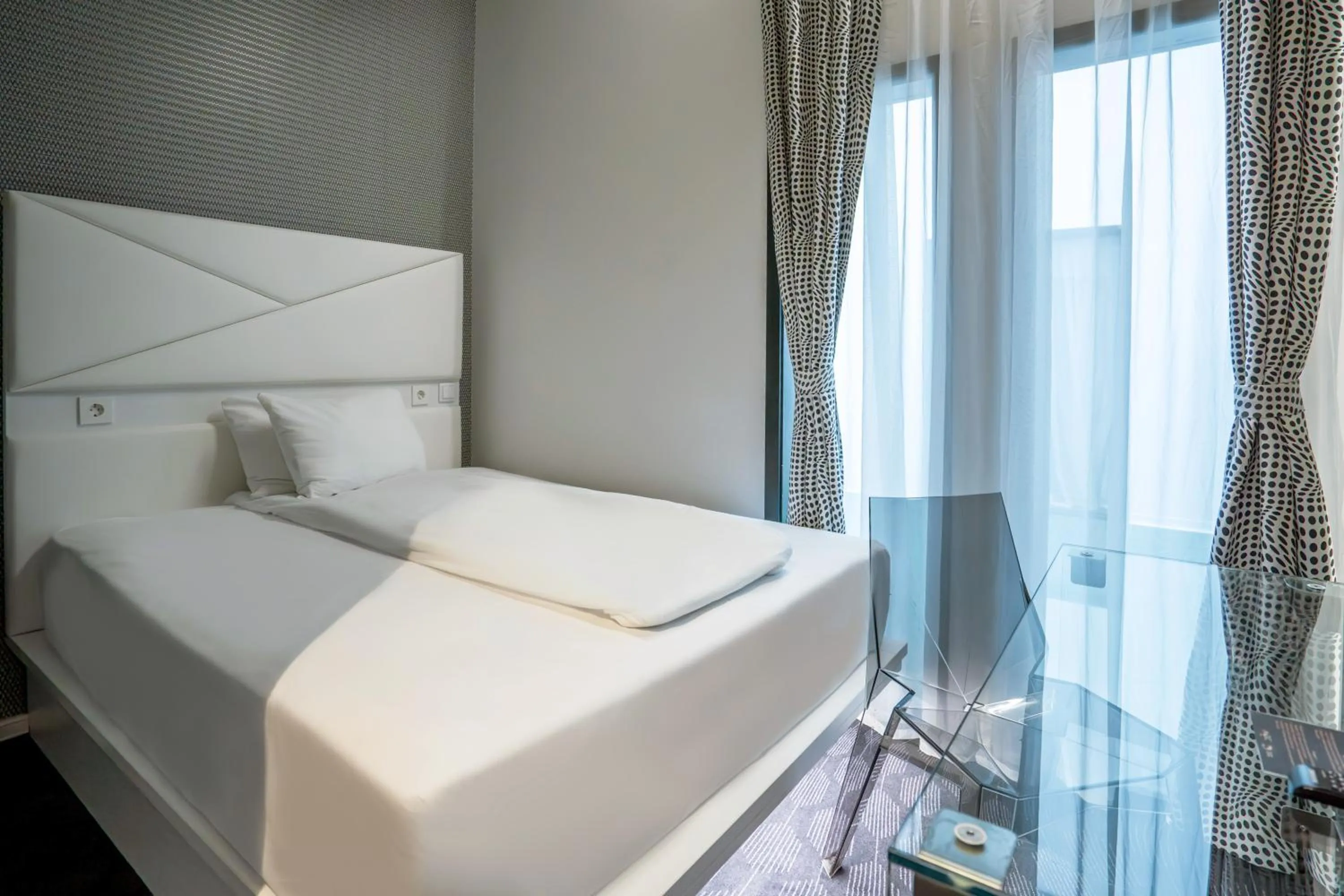 Bed in Magic Hotel Bergen City Center, a member of Radisson Individuals