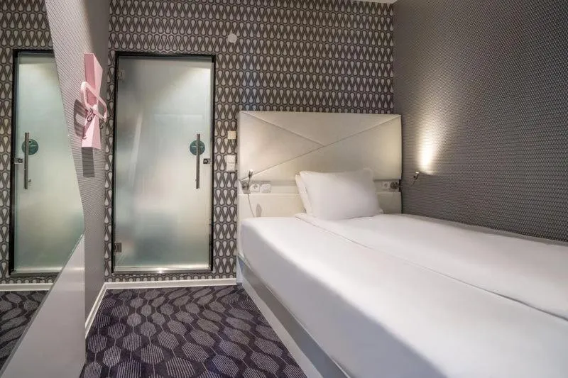 Bed in Magic Hotel Bergen City Center, a member of Radisson Individuals