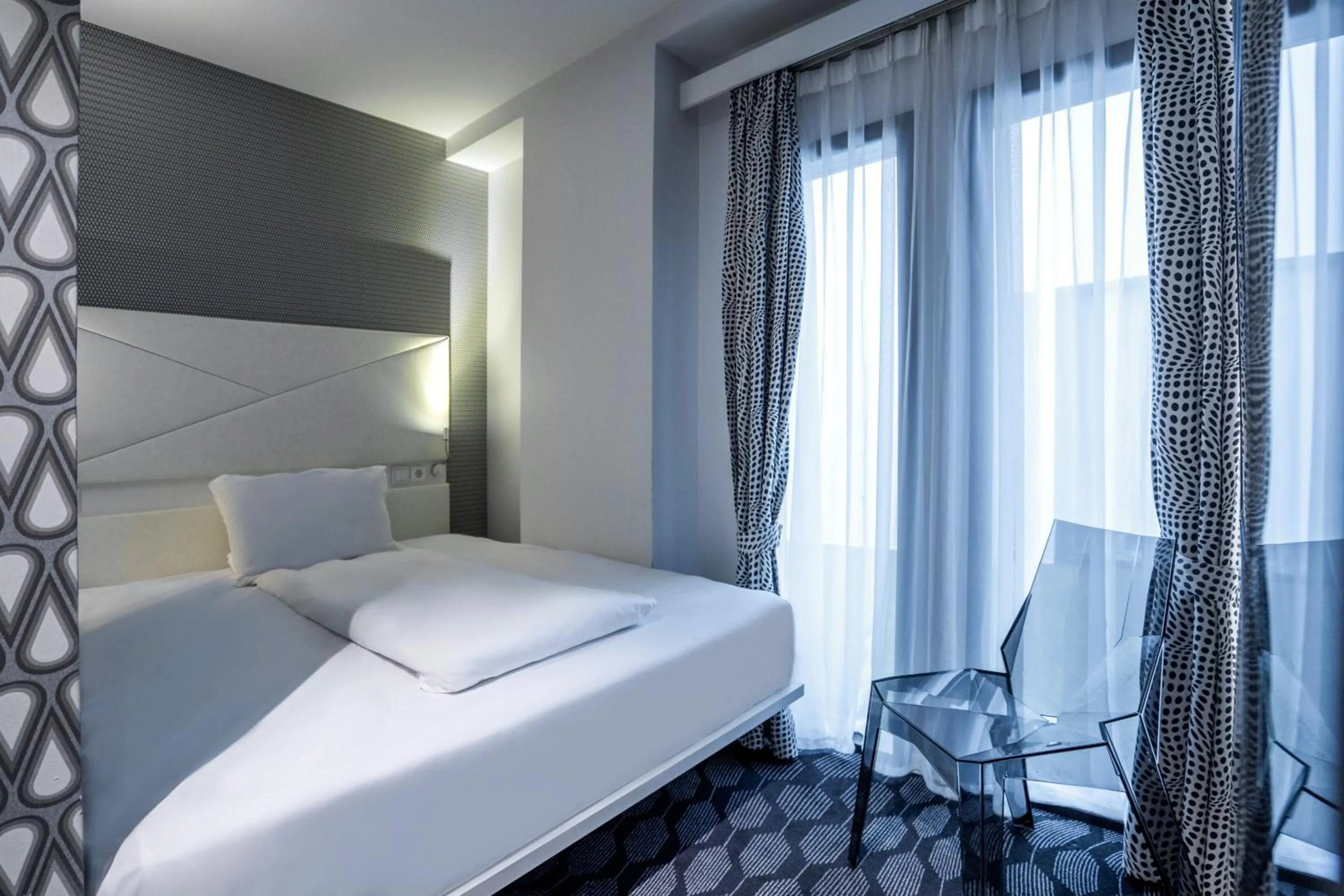 Bed in Magic Hotel Bergen City Center, a member of Radisson Individuals