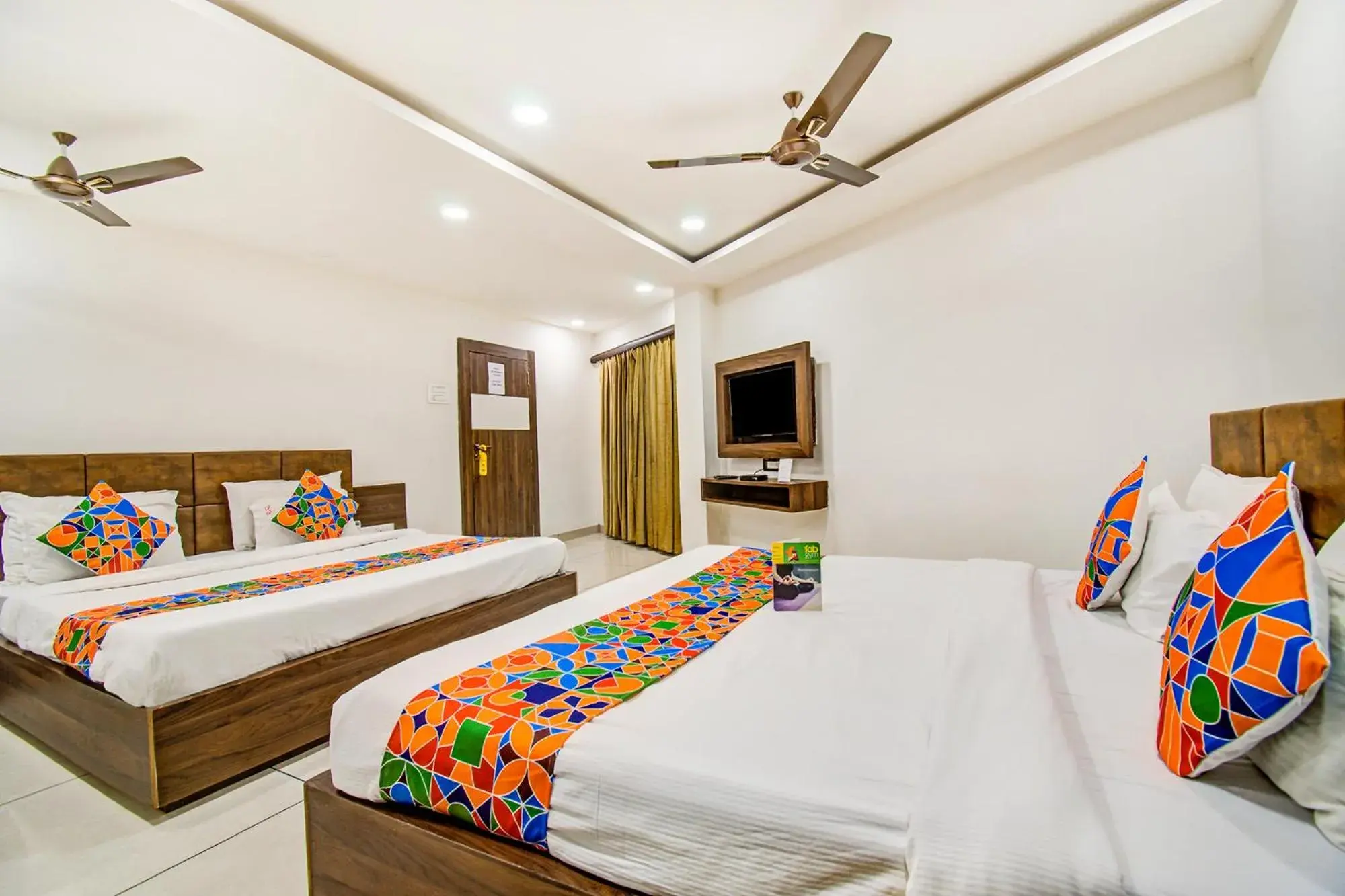 TV and multimedia, Bed in FabHotel Rajnandani Residency Bhawarkua TV and multimedia, Bed in FabHotel Rajnandani Residency Bhawarkua