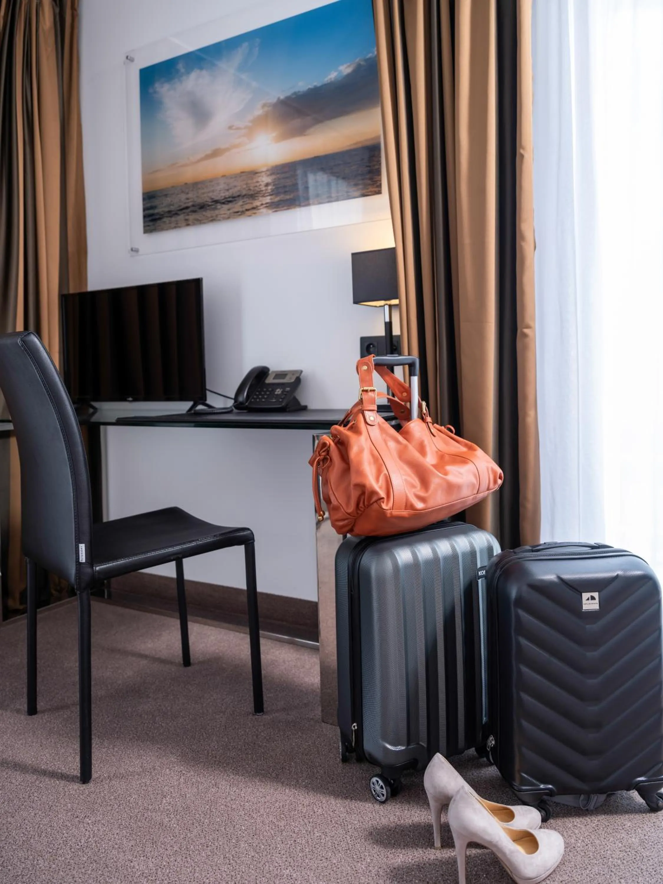 TV and multimedia in Golden Tulip La Baule Hotel and Residence