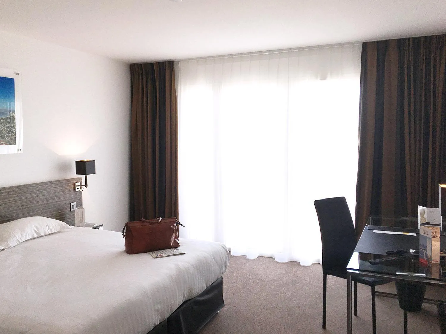 Photo of the whole room, Bed in Golden Tulip La Baule Hotel and Residence