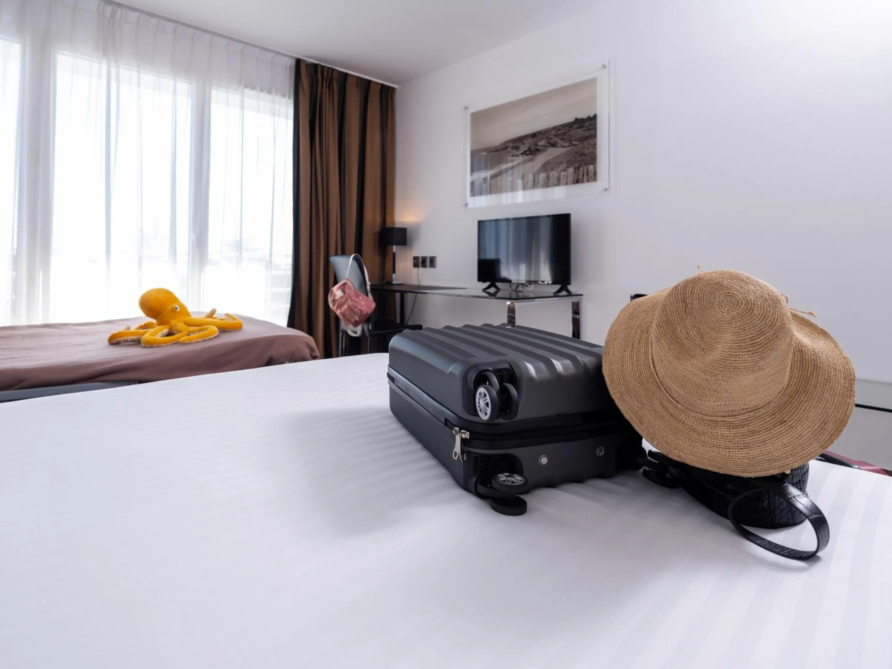 Photo of the whole room, Bed in Golden Tulip La Baule Hotel and Residence