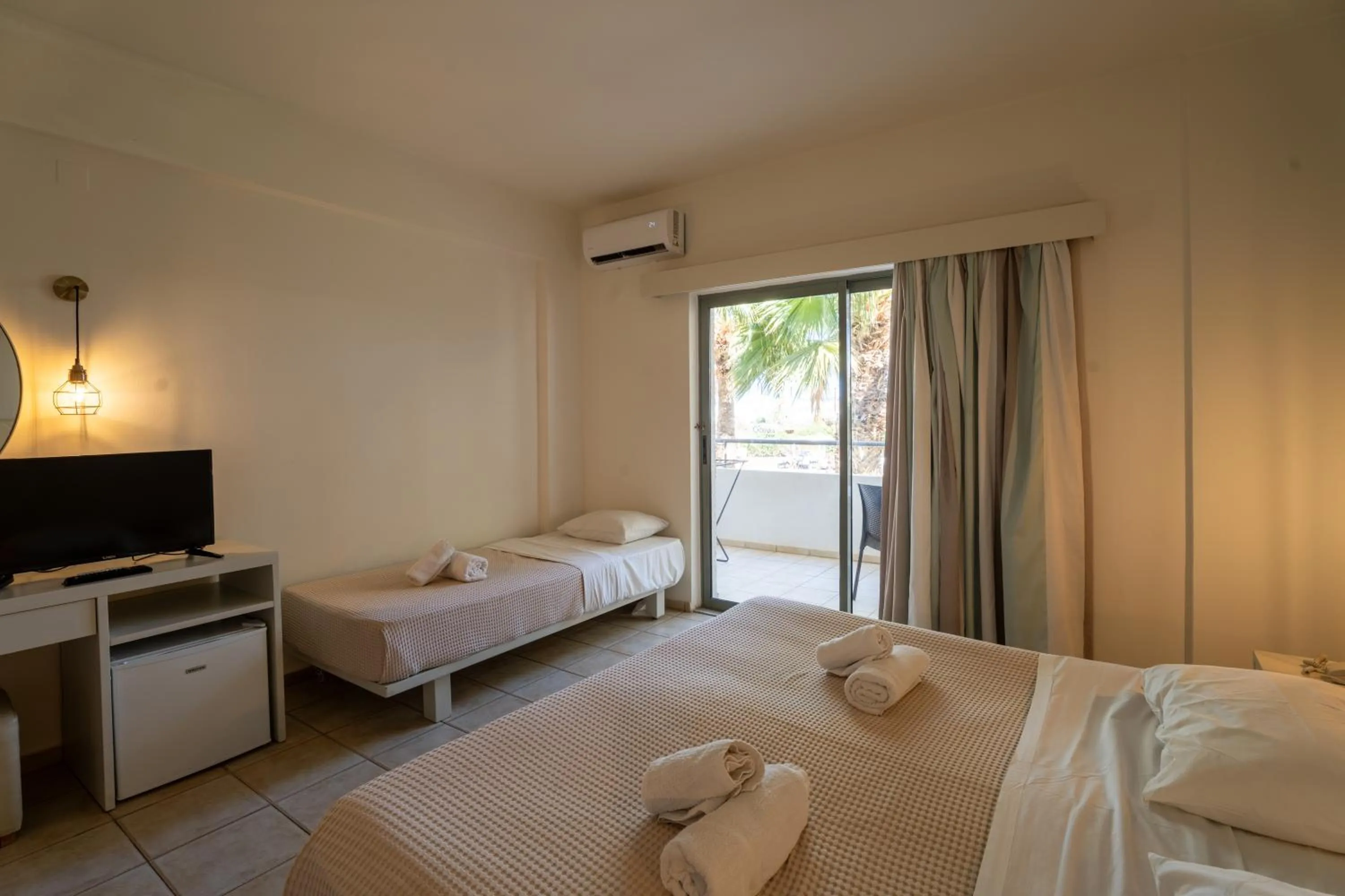 Bedroom, Bed in Gouves Bay by Omilos Hotels