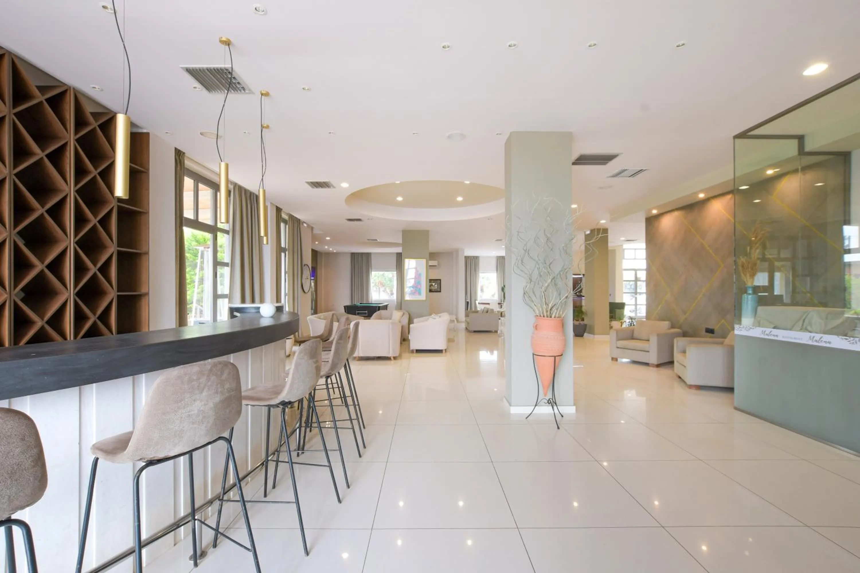 Seating area in Gouves Bay by Omilos Hotels